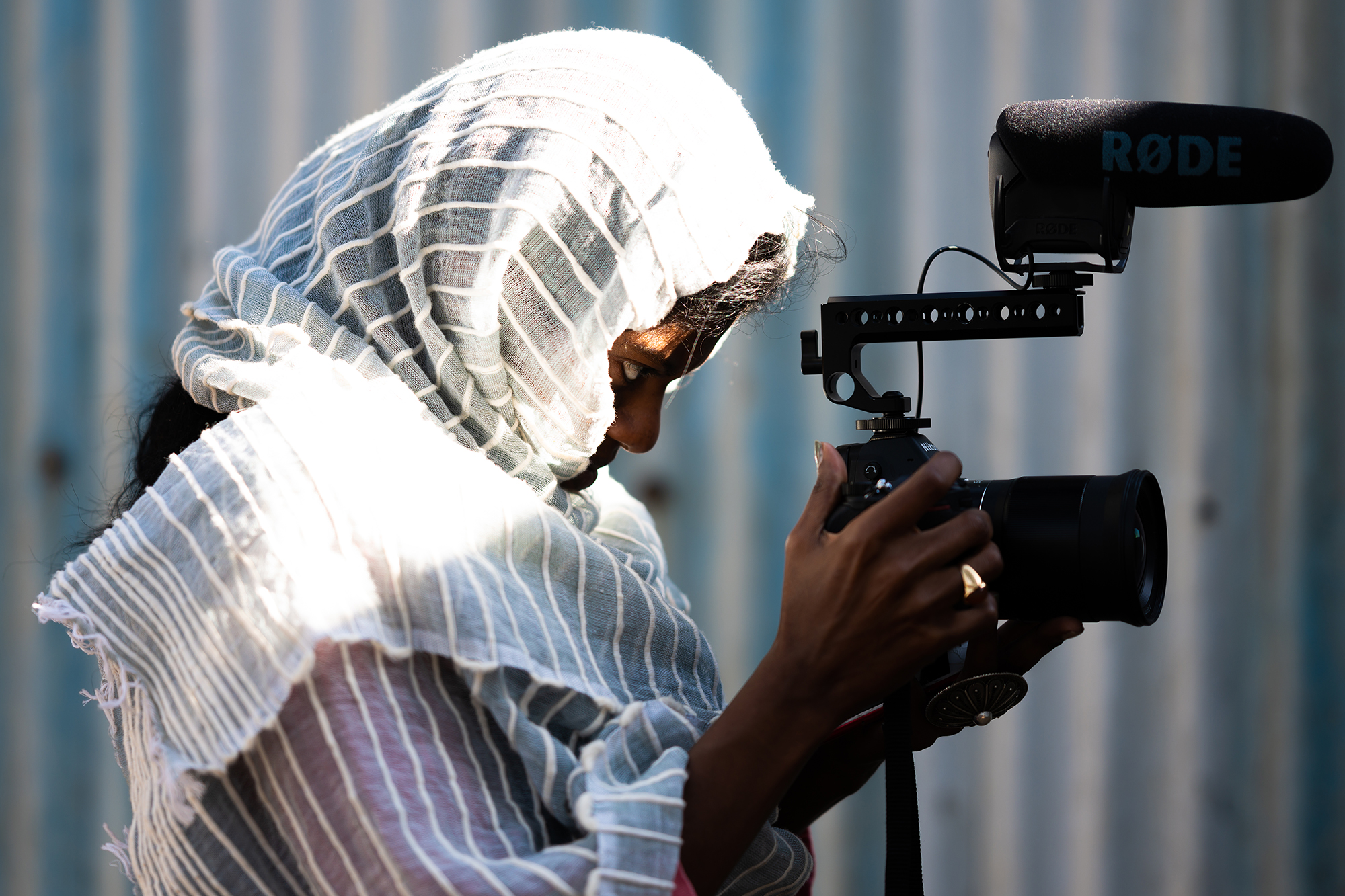 sosena filming with video camera