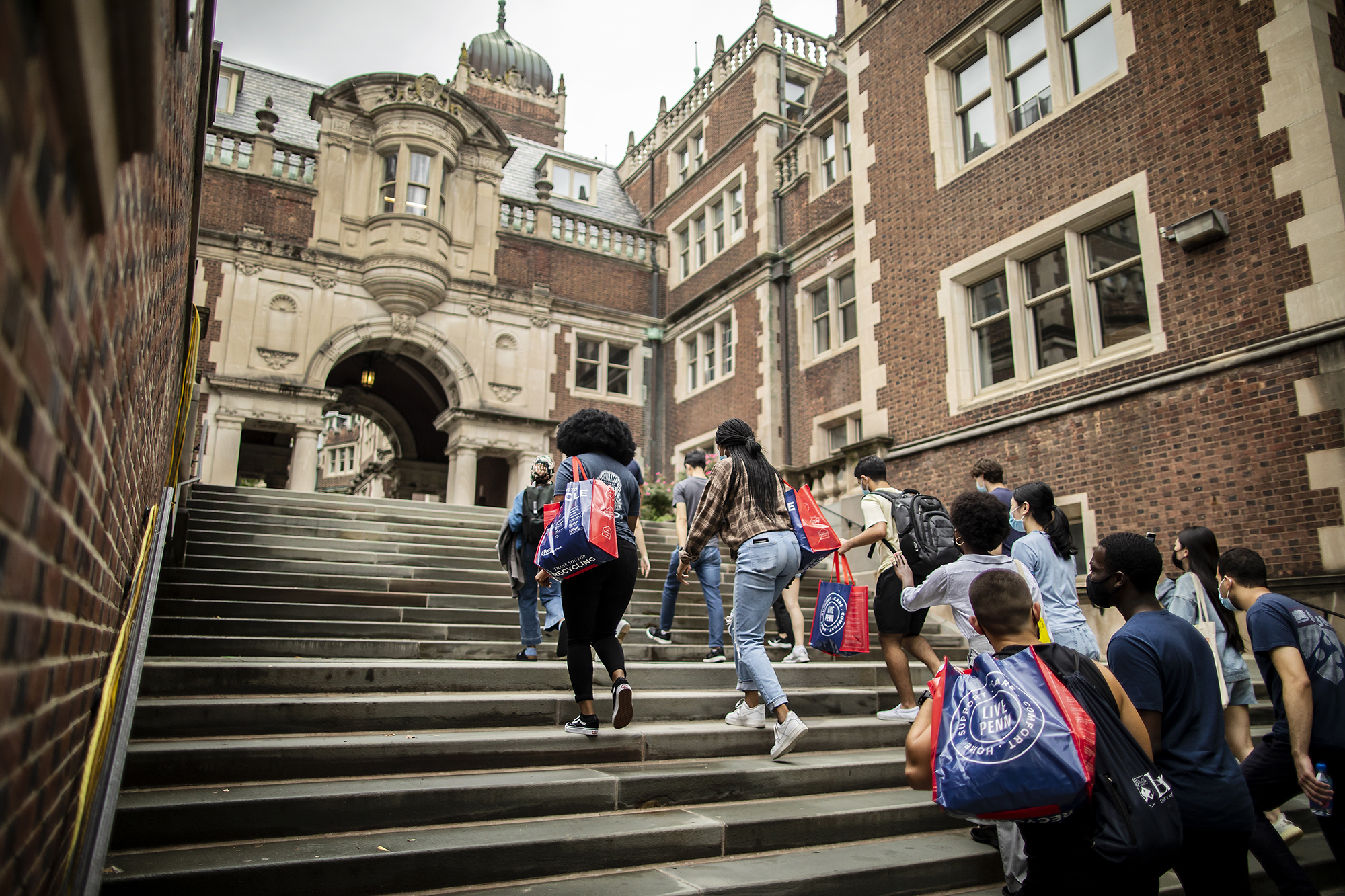students walking up the steps inside the Quad