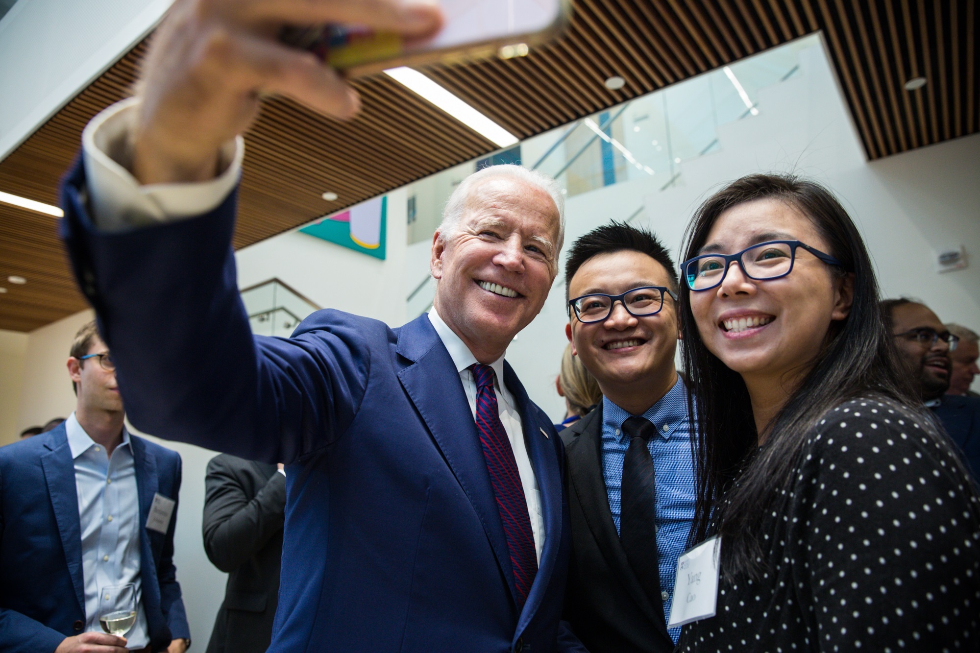 president biden taking selfie with students