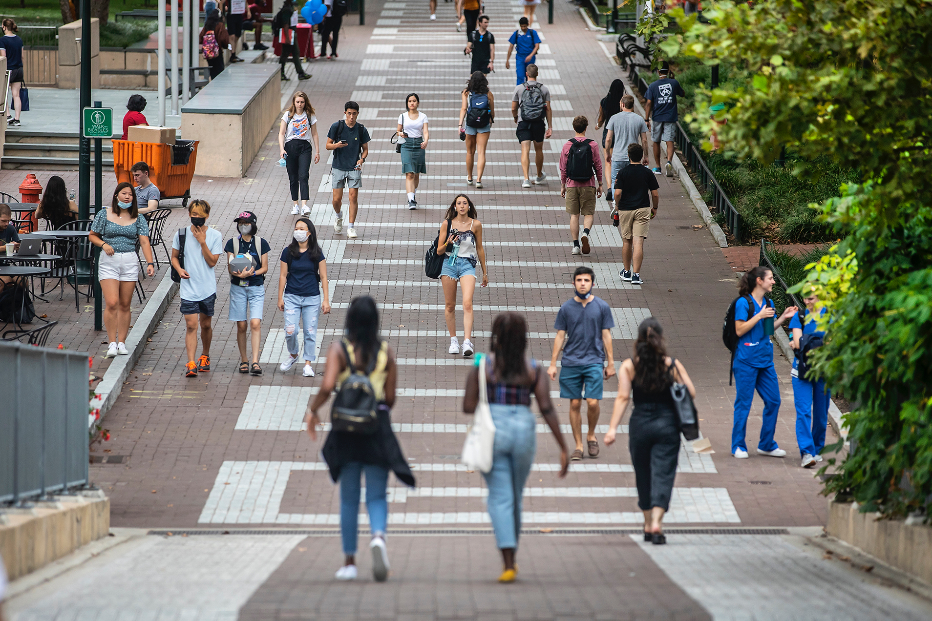 people walking down locust walk