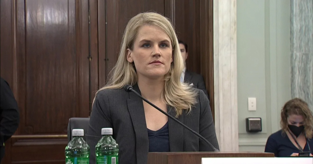Frances Haugen seated at a microphone testifying before Congress.