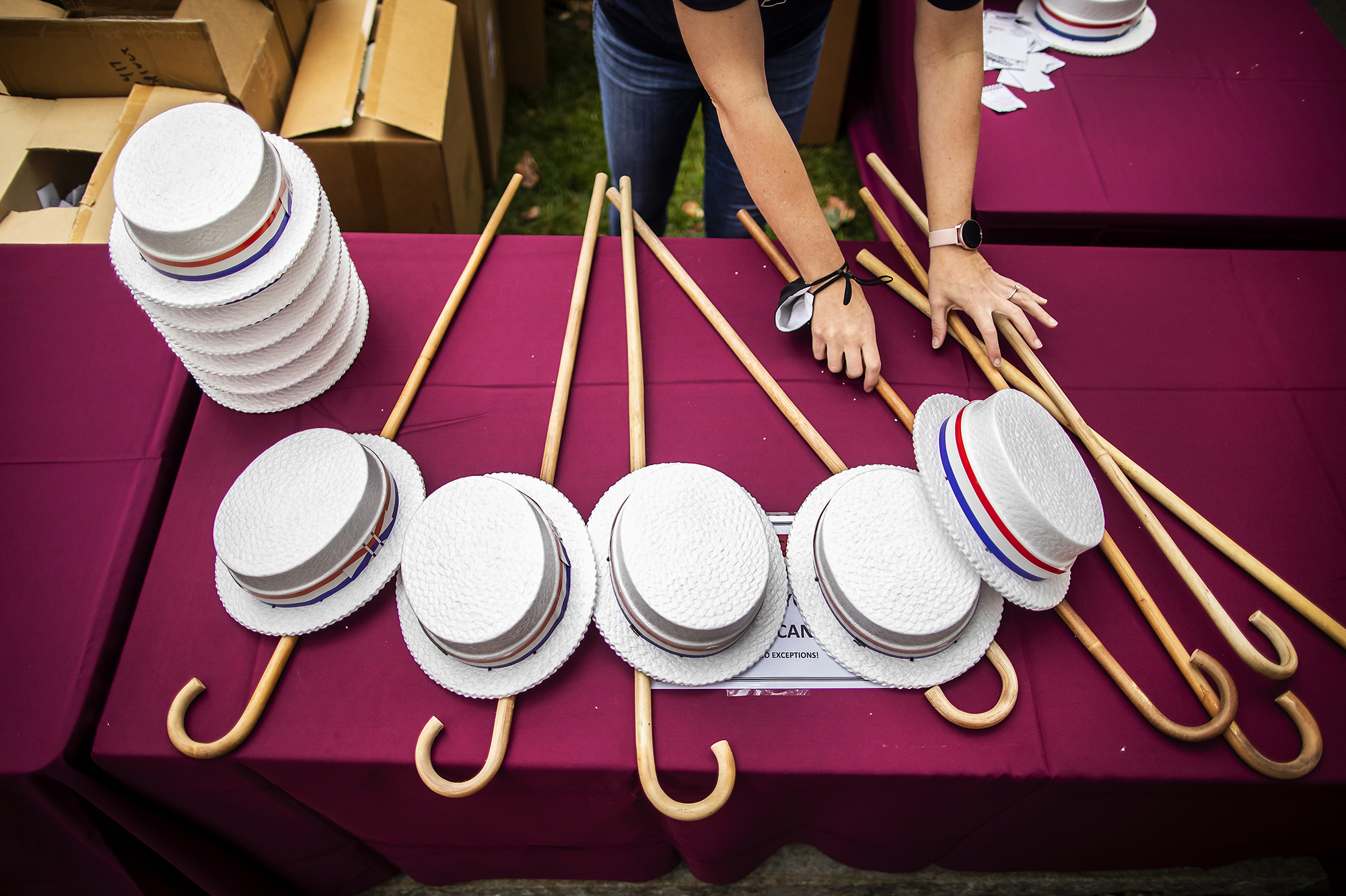 table with hats and canes