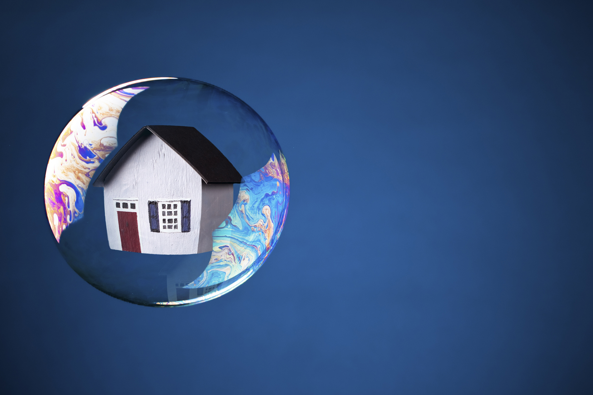 computer generated image of house in a bubble.