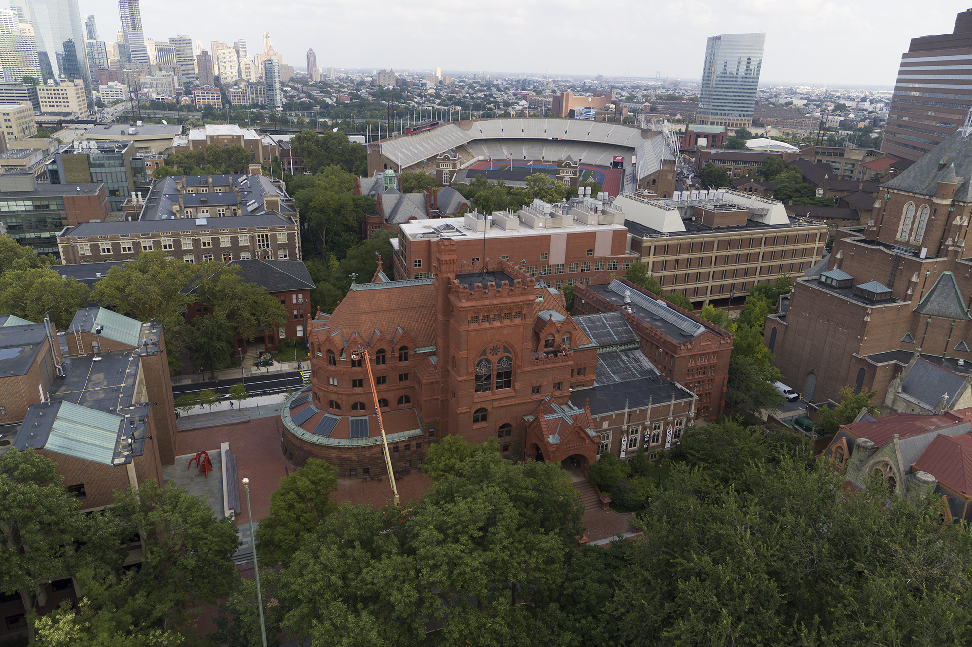 Aerial view of Fisher Fine Arts building, Franklin Field, and city of Philadelphia in the background.