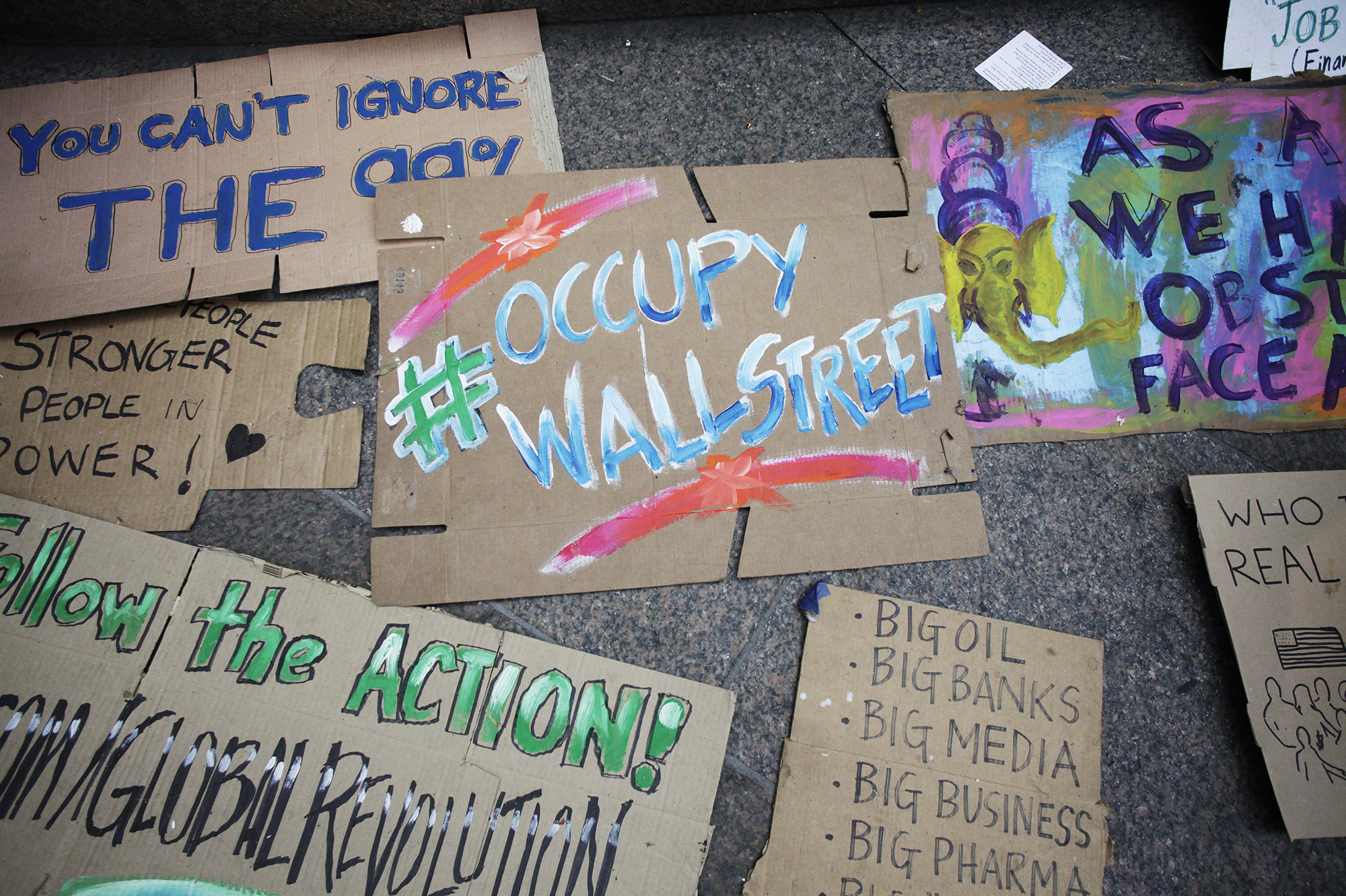 occupy wall street signs