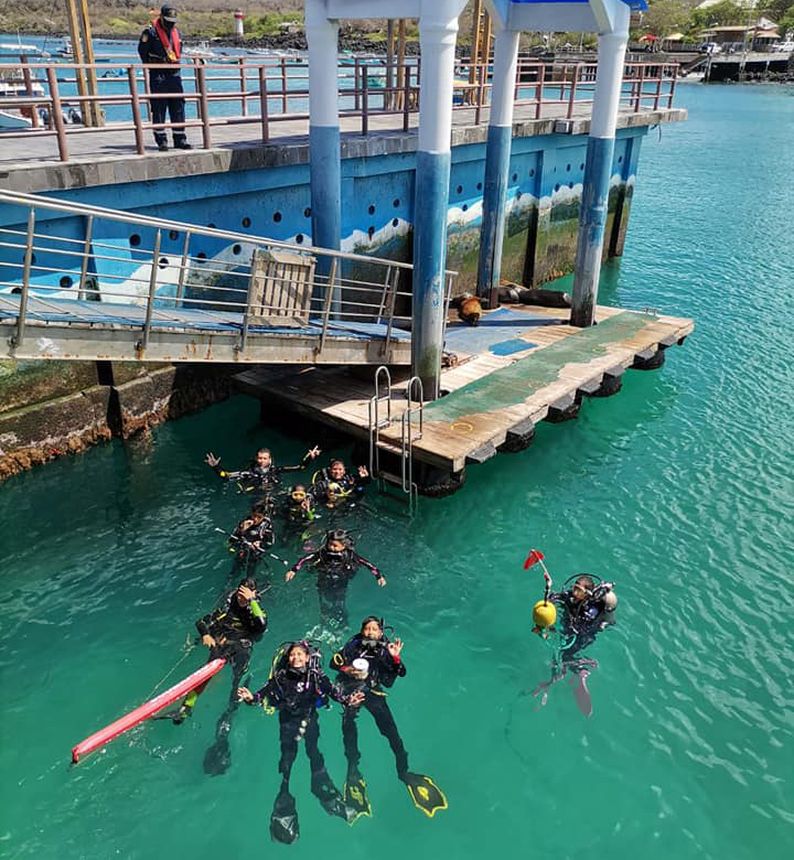 student divers in water