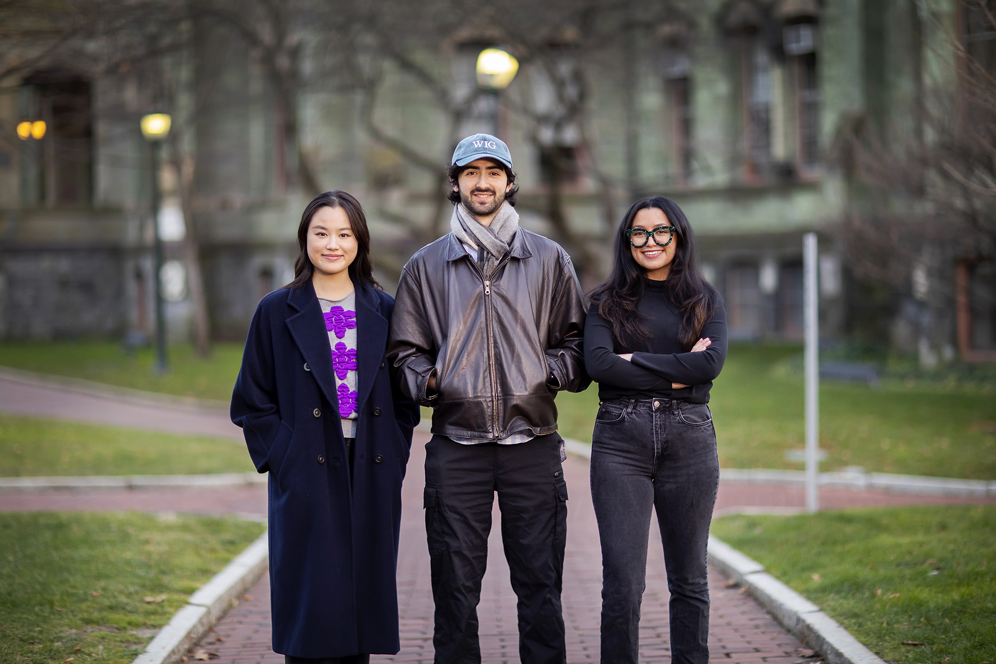 Three students standing outside