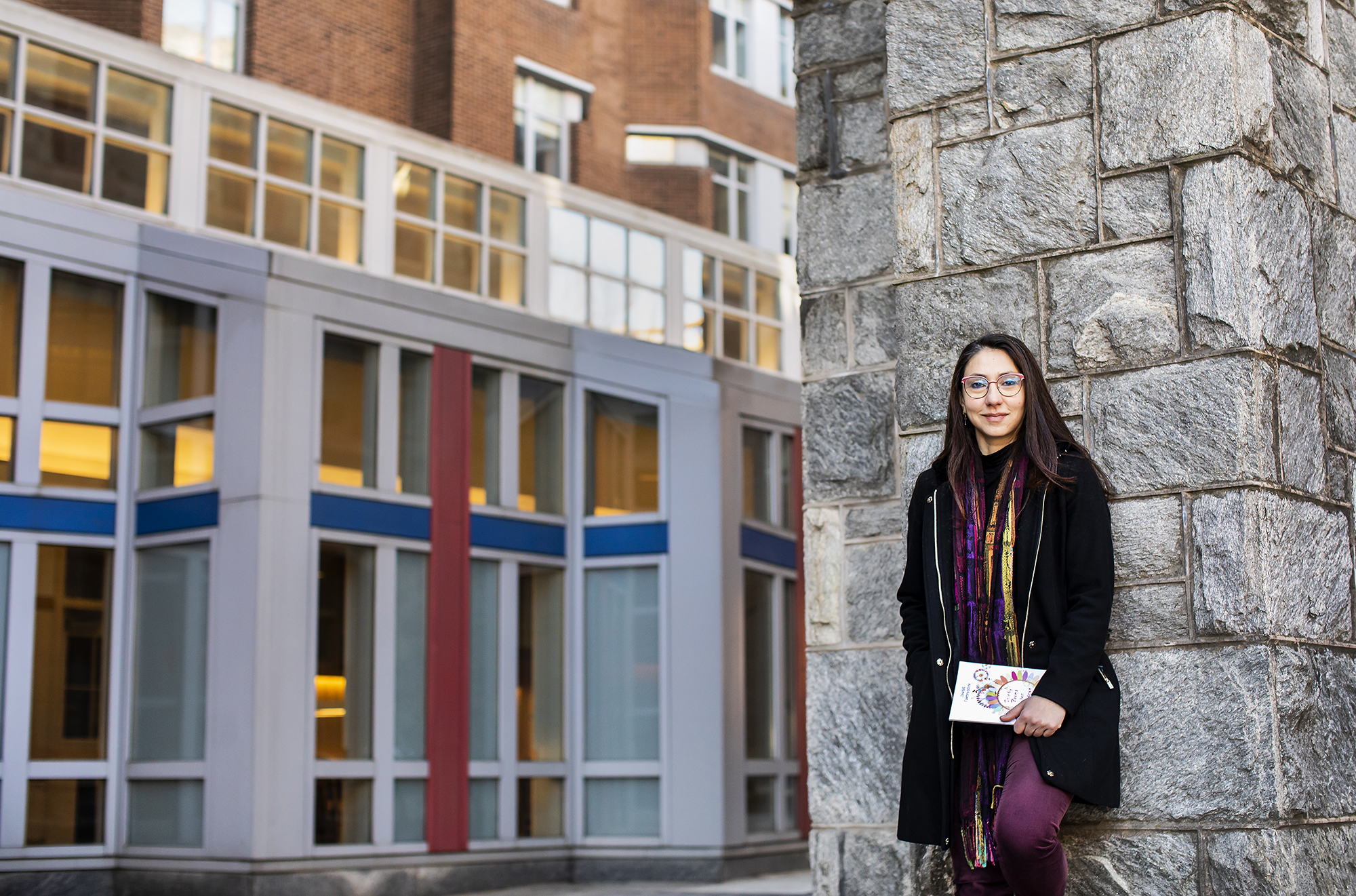 Huda Fakhreddine leaning against a wall outside