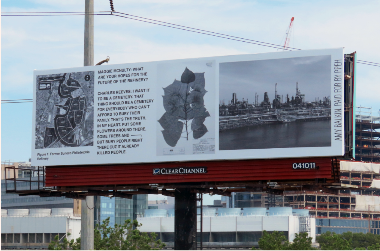 billboard about the refinery