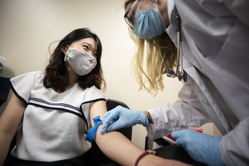 nursing student takes blood