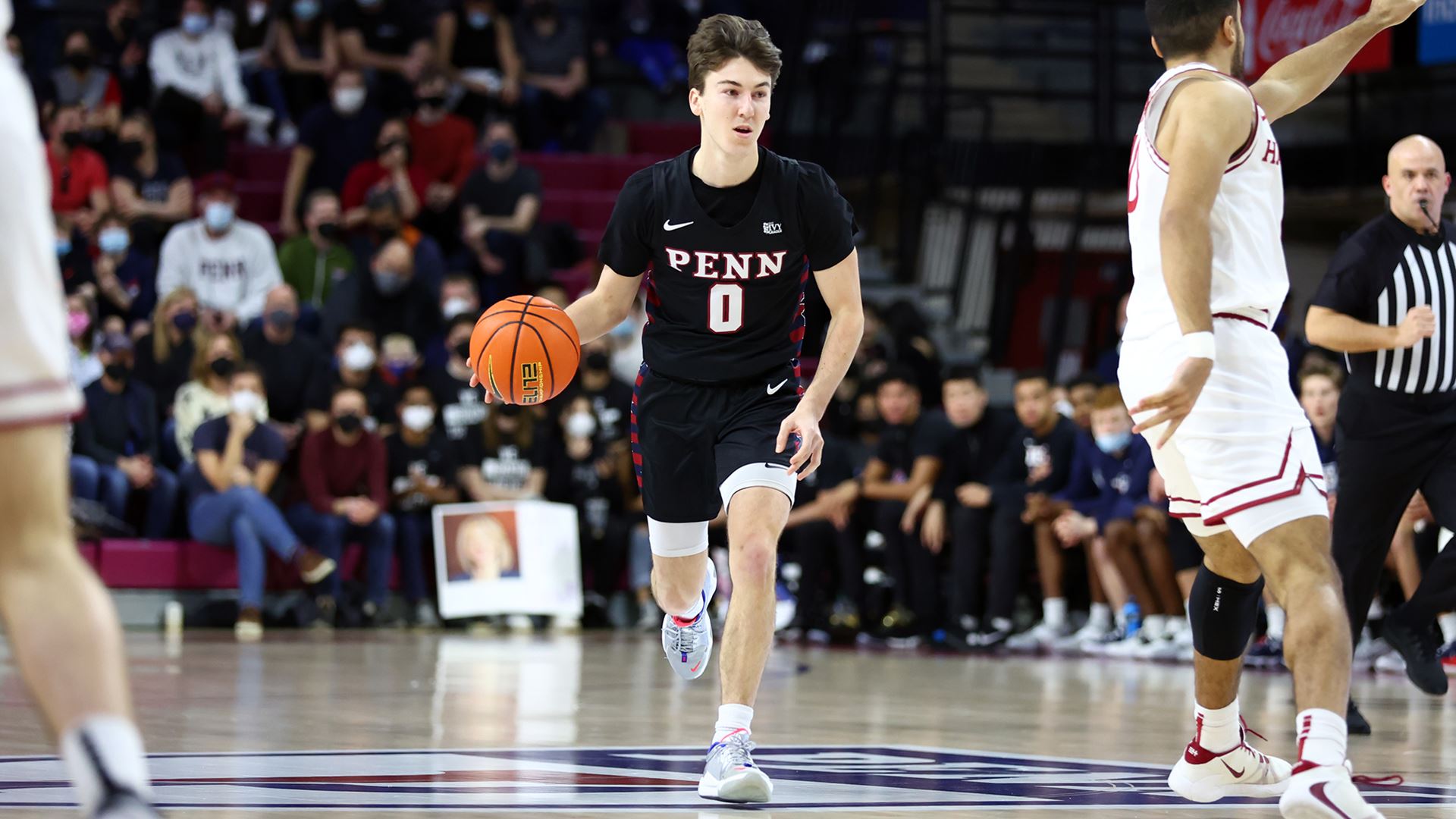 Slajchert dribbles the ball up the court against Harvard at the Palestra.