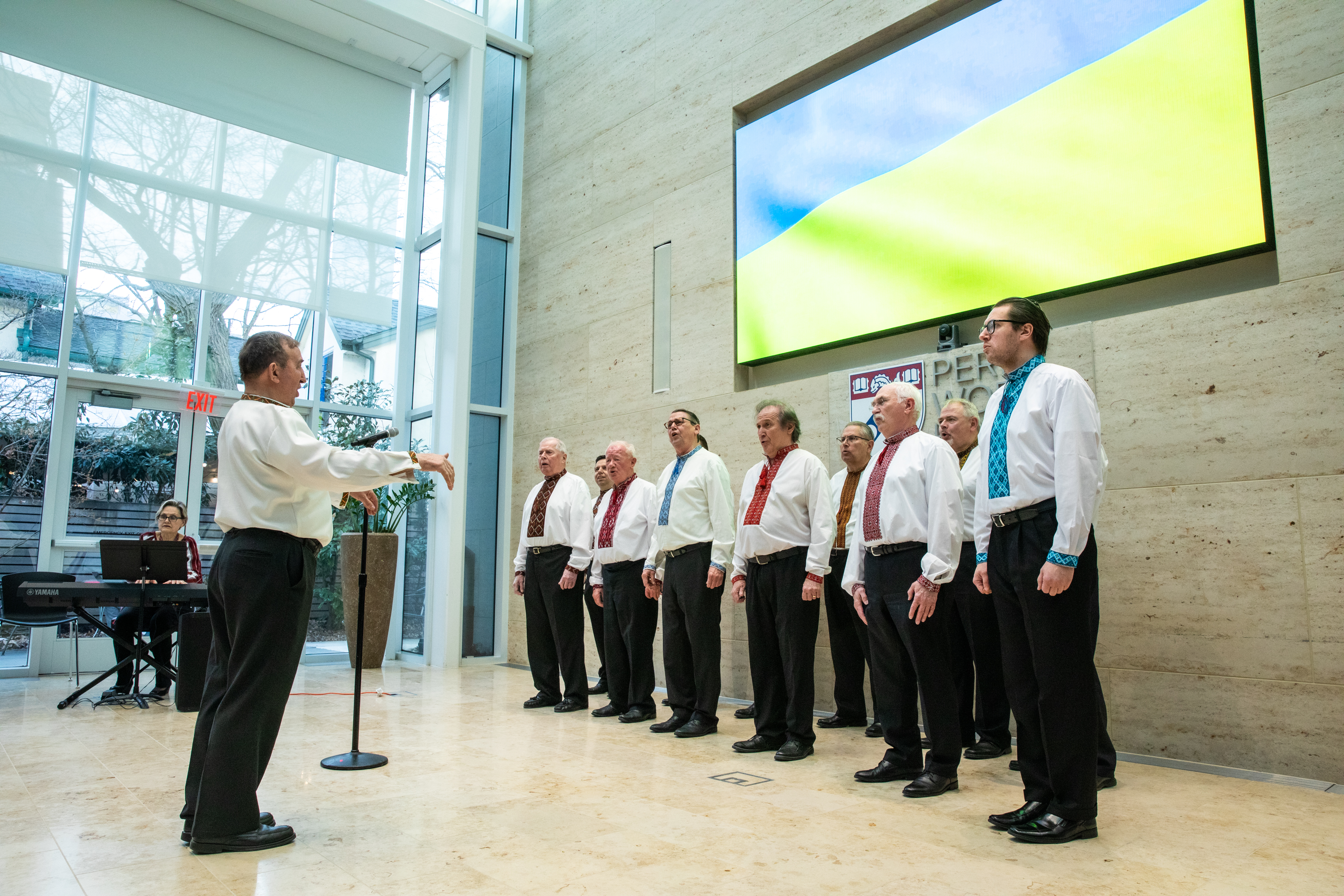 Members of the Ukrainian choir singing at Perry World House.