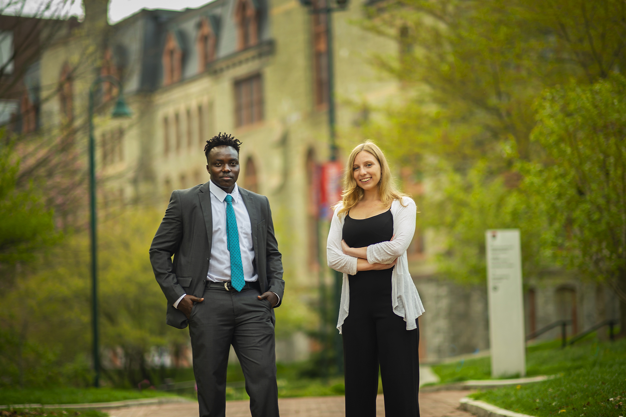 Martin Leet and Leah Voytich standing in front of College Hall.