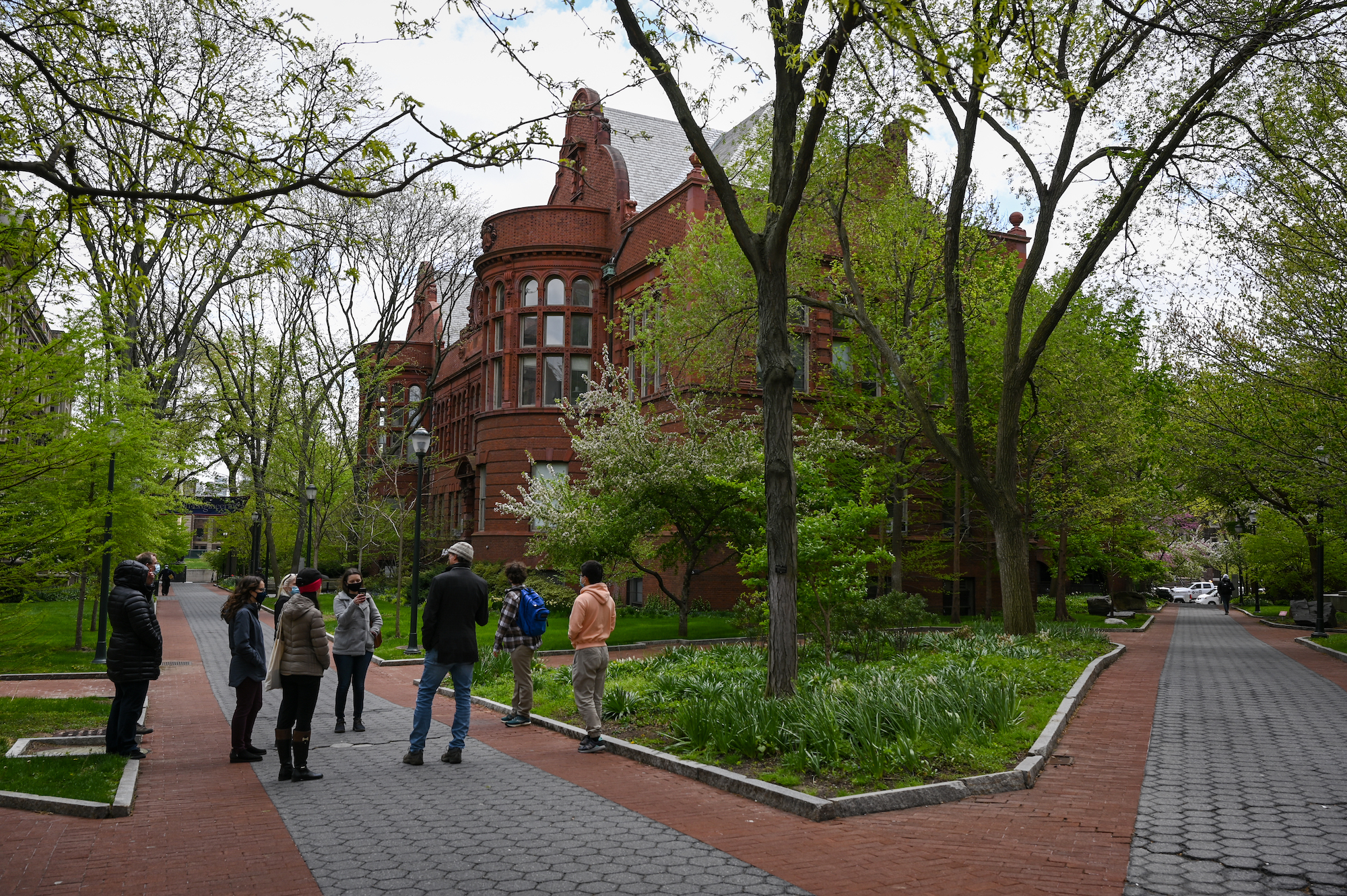 ecology tour of Penn campus showing spring landscape and building