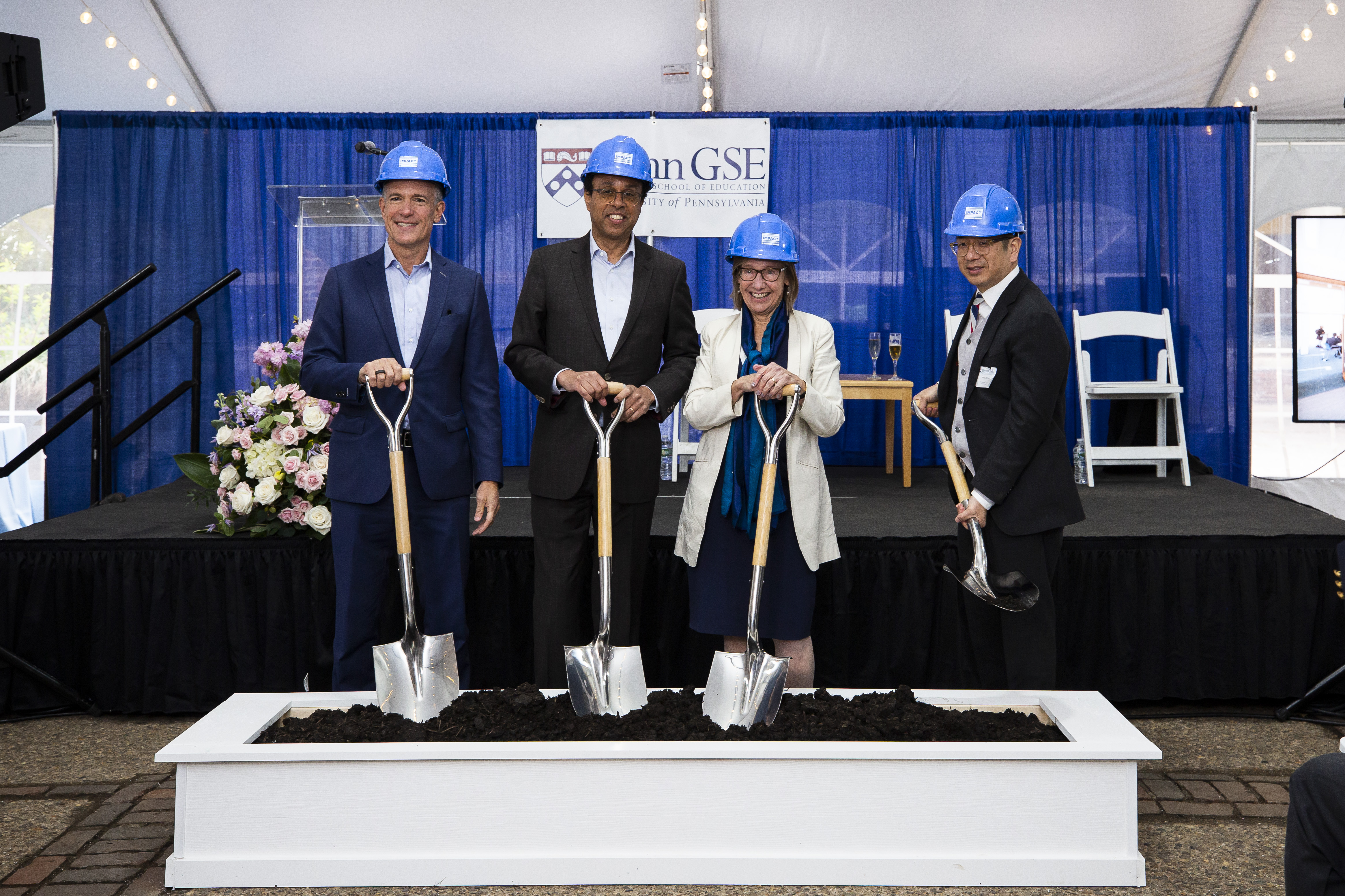 Korn, Pritchett, Grossman and Chen pose with silver shovels at GSE groundbreaking ceremony