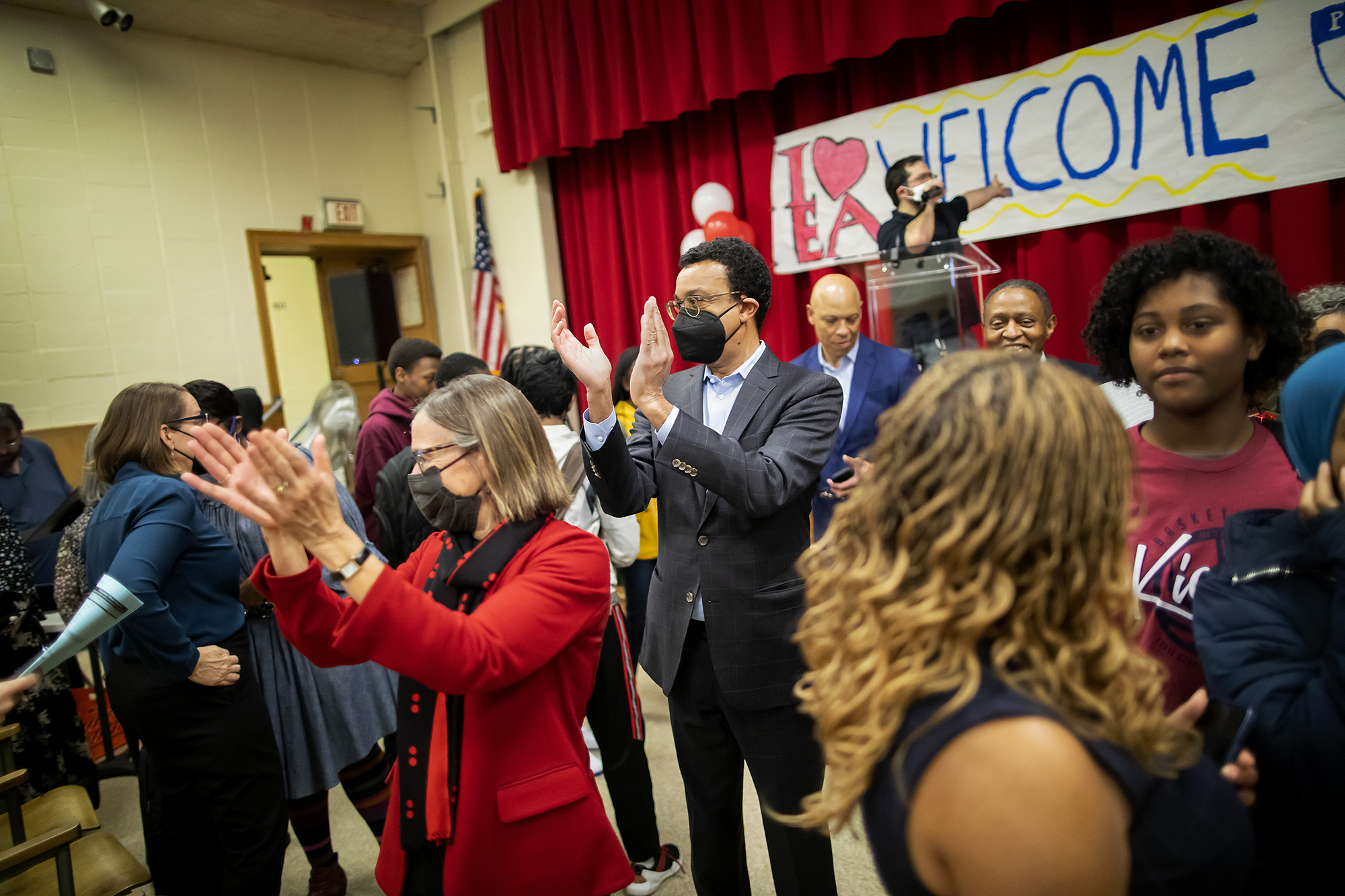 Grossman and Pritchett clap in busy auditorium at Lea School