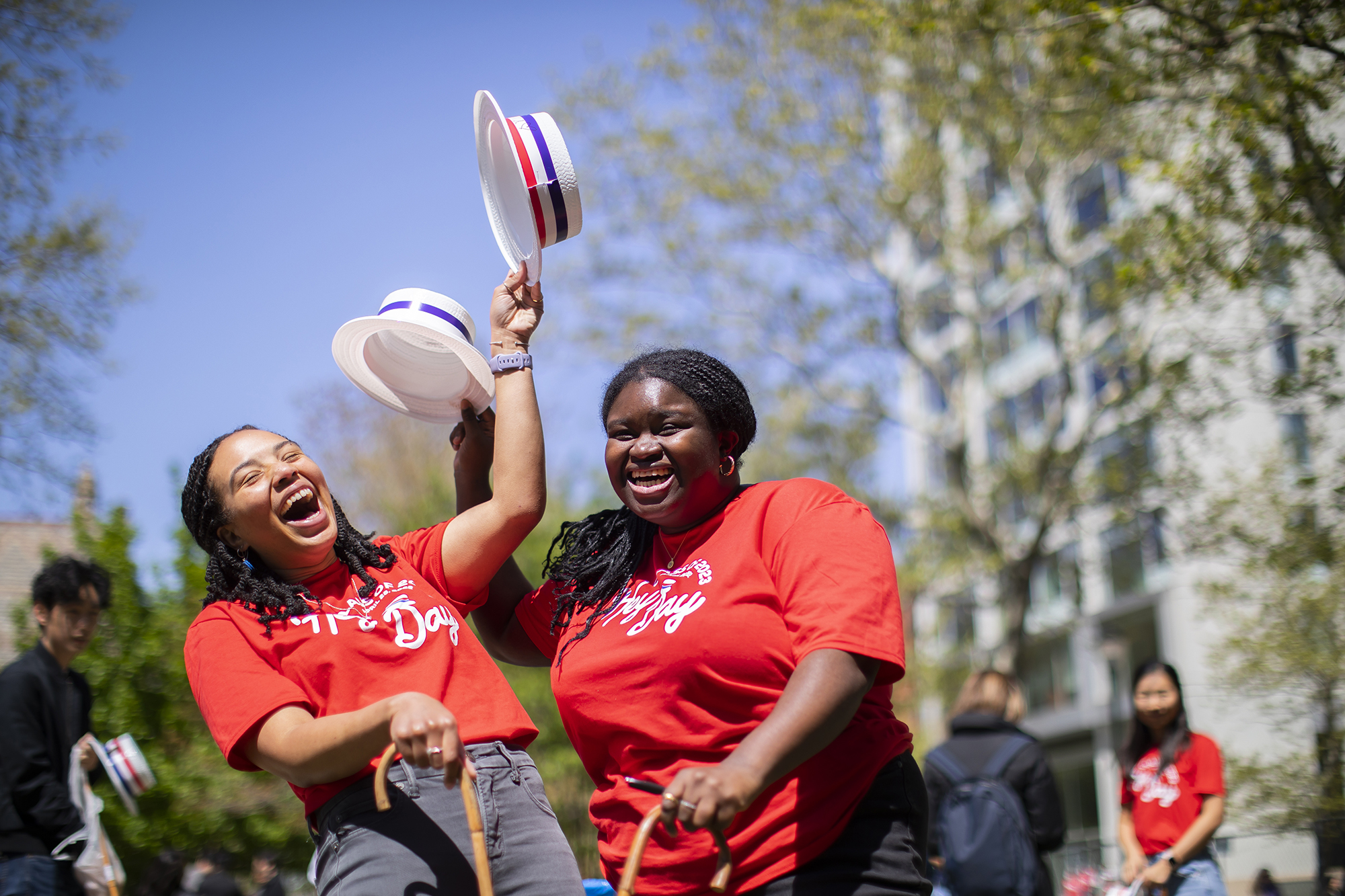 penn students at the hey day picnic with hats off