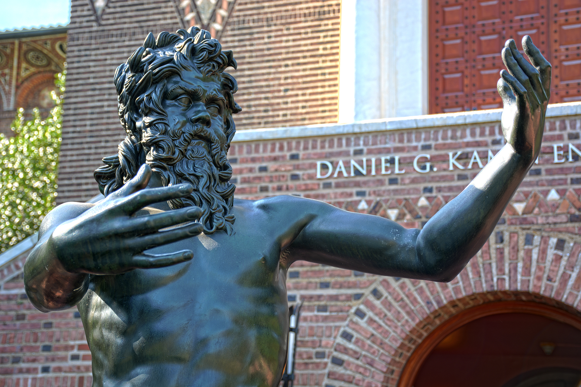 bronze statue in warden garden of penn museum