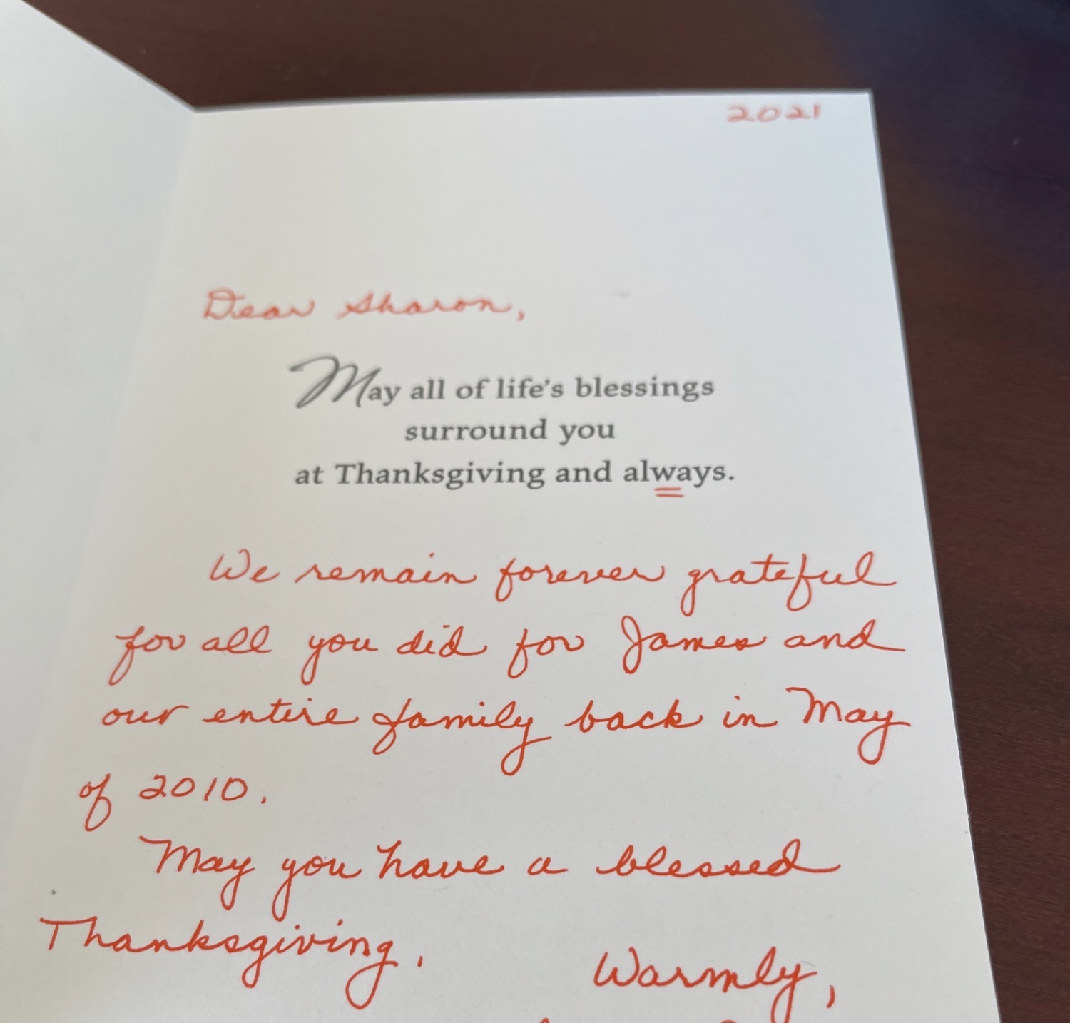 A Thanksgiving greeting card reads "Dear Sharon, We remain forever grateful for all you did for James and our entire family back in May of 2010. May you have a blessed Thanksgiving."