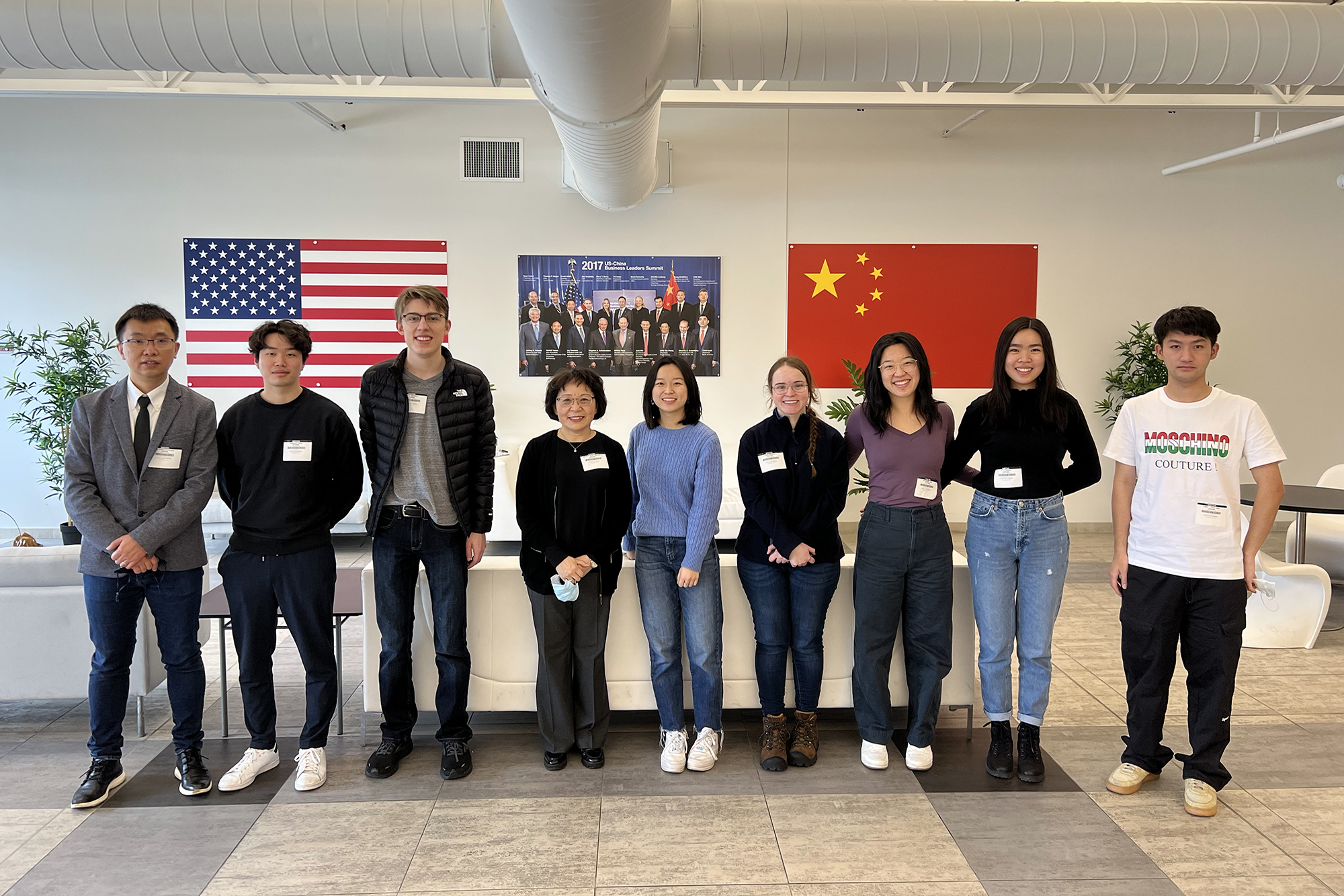 Students posing for a photo inside Fuyao America building