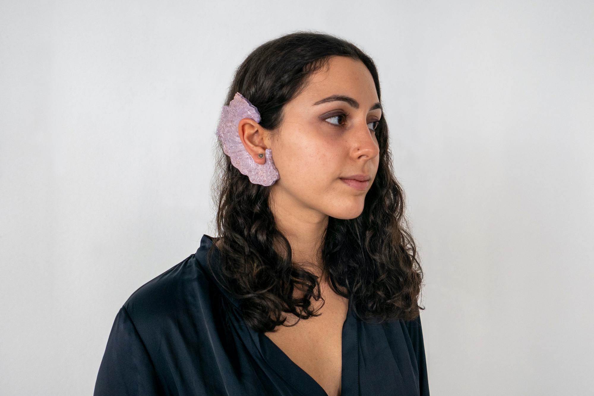 Eleanor Shemtov in profile showing cuff surrounding her ear 