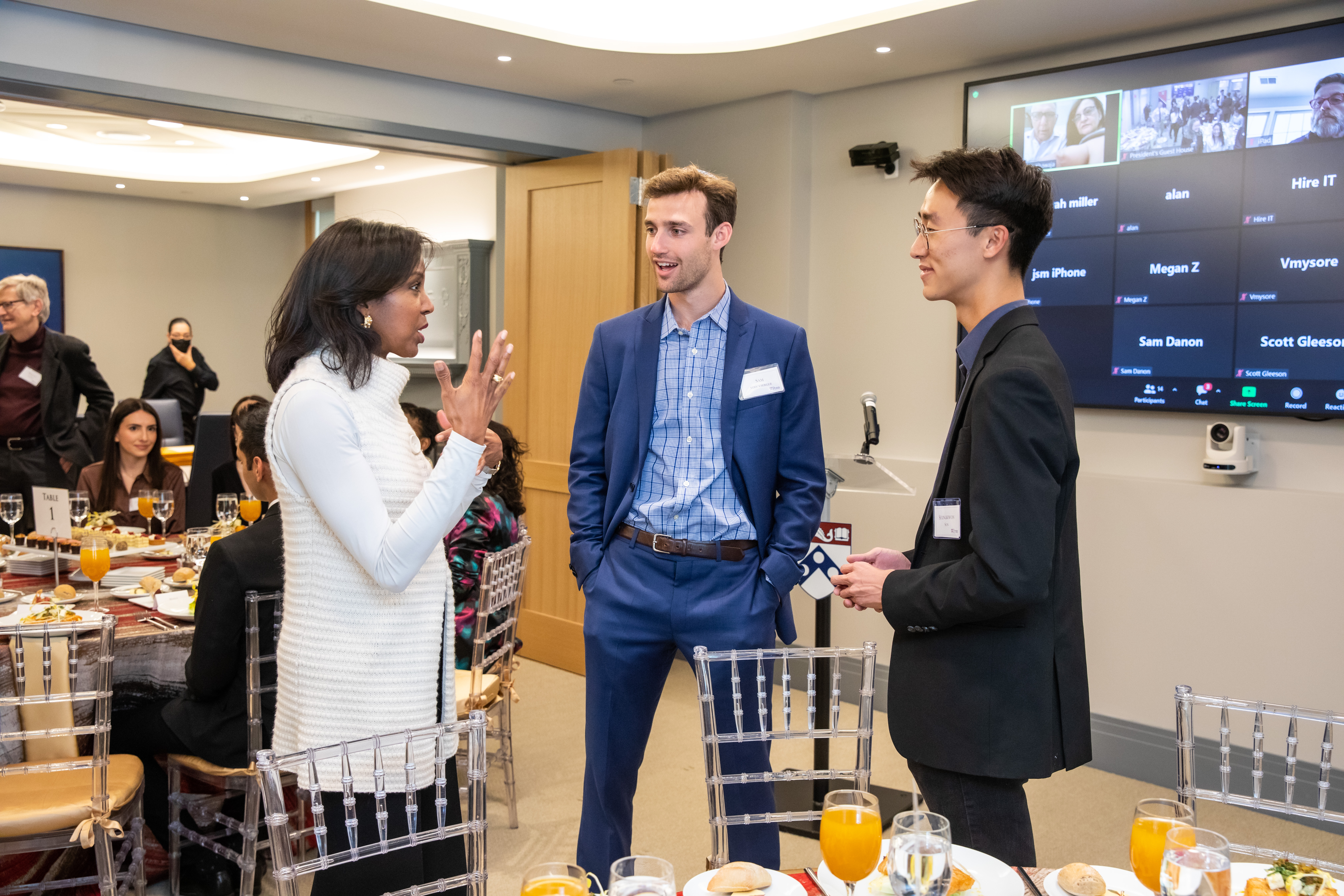 Sam Strickberger and Seungkwon Son converse with Wharton Dean Erika James at the recent President’s Innovation Prize/President’s Engagement Prize luncheon.