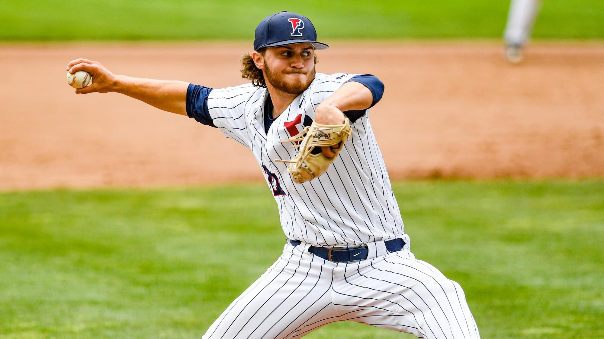 Eaise prepares to throw a pitch during a game.