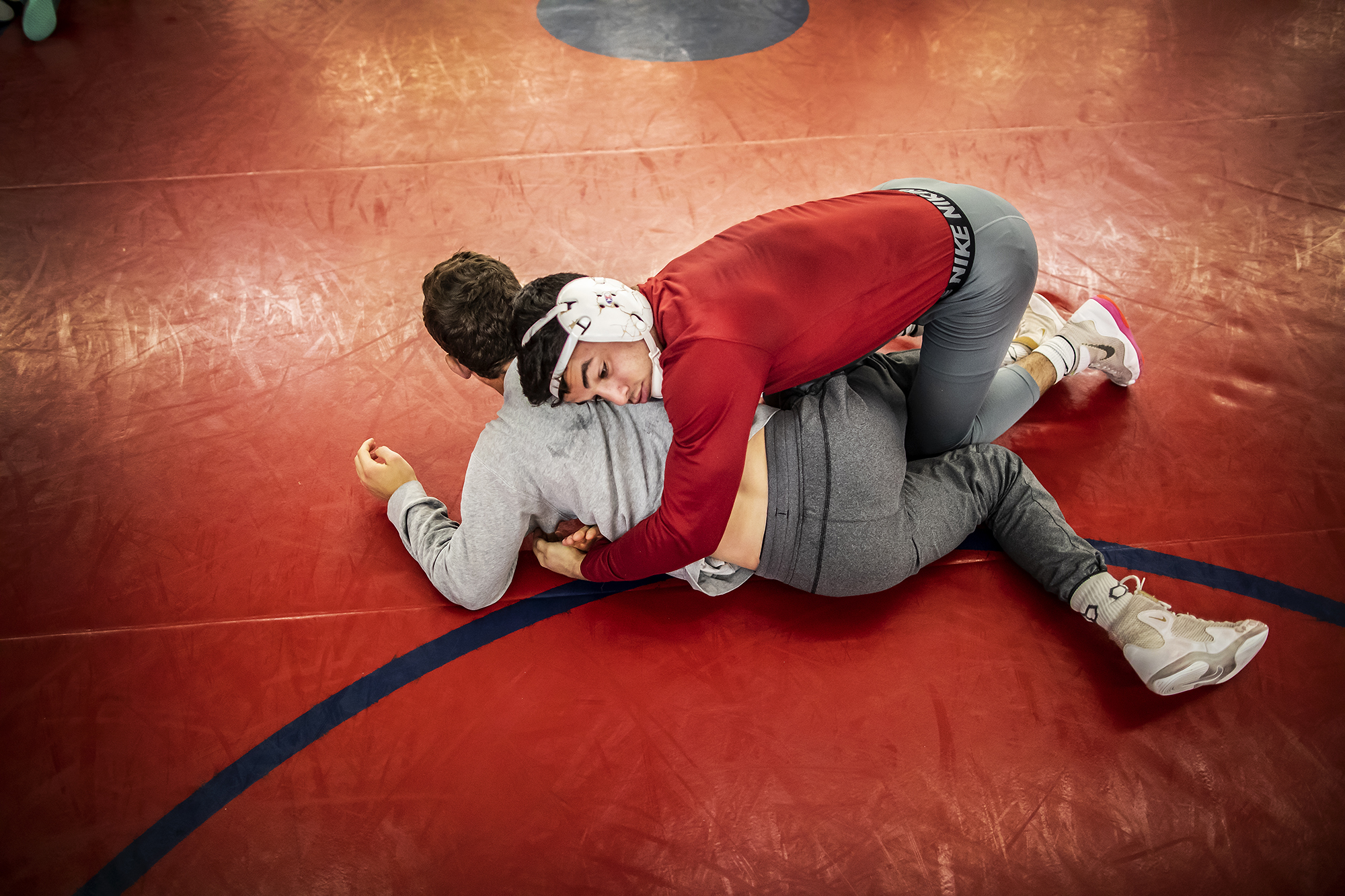 student wrestlers practice at the training center