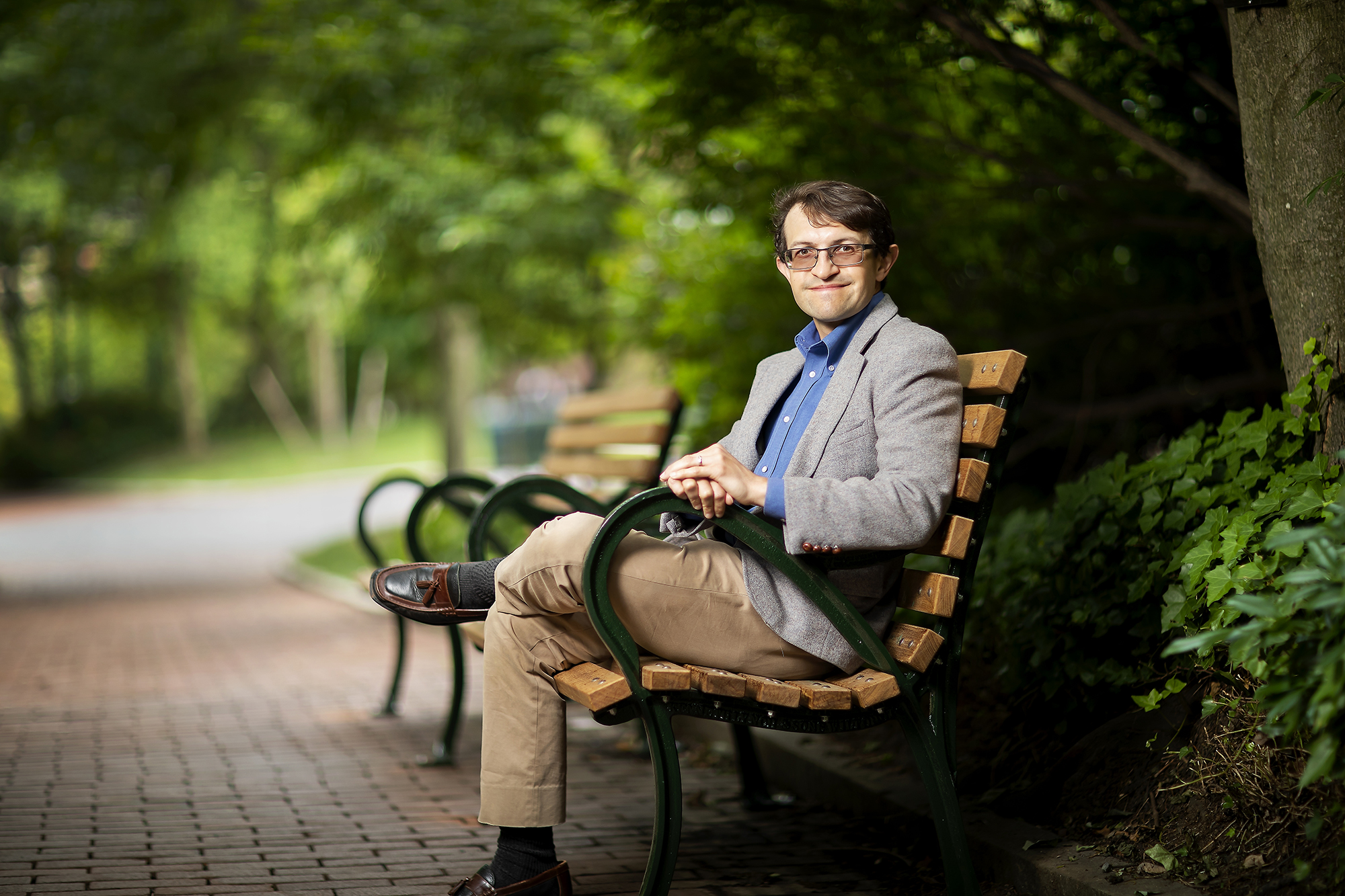 Scott Moore sitting on a bench