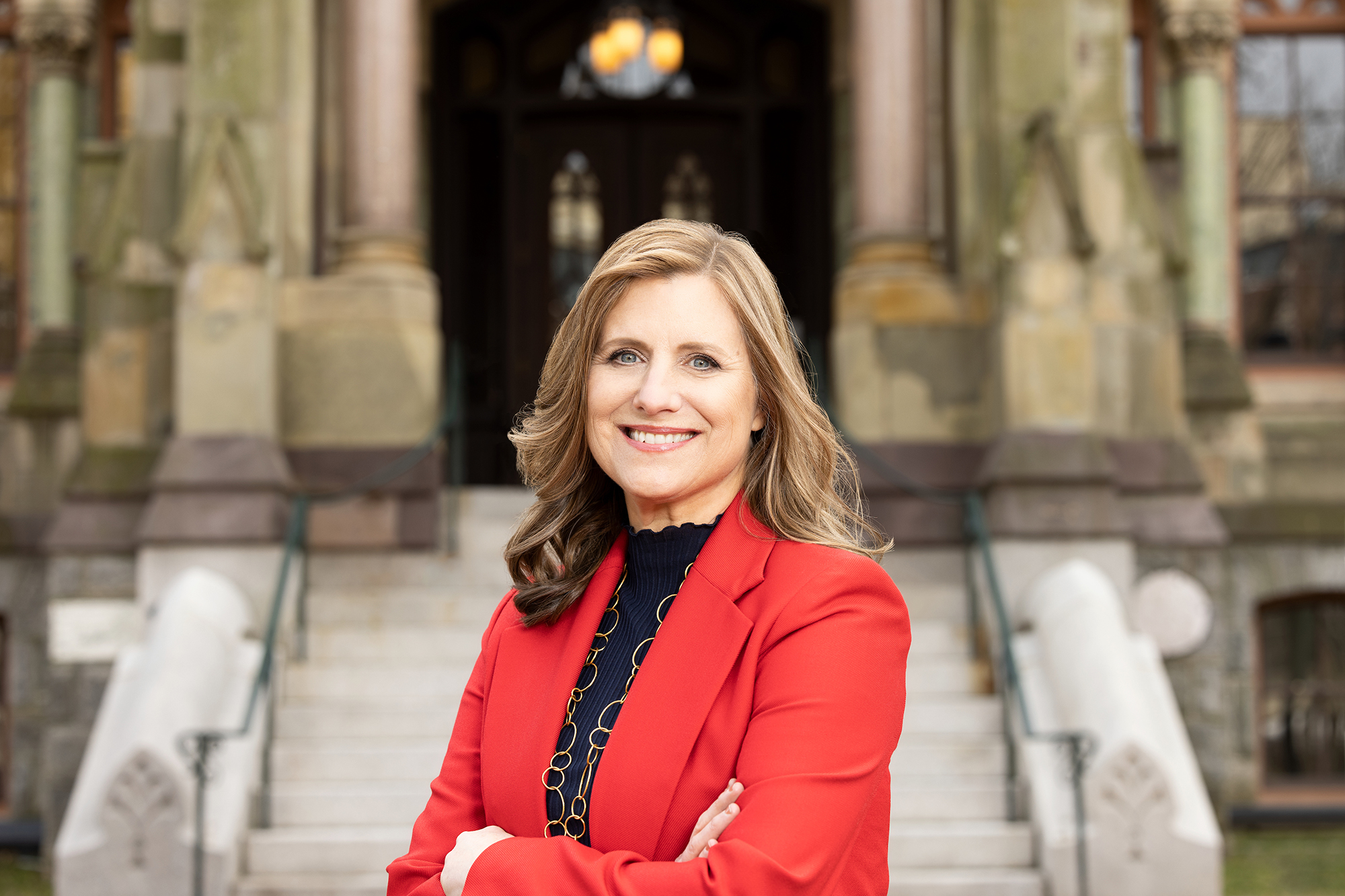 Liz Magill stands in front of College Hall.