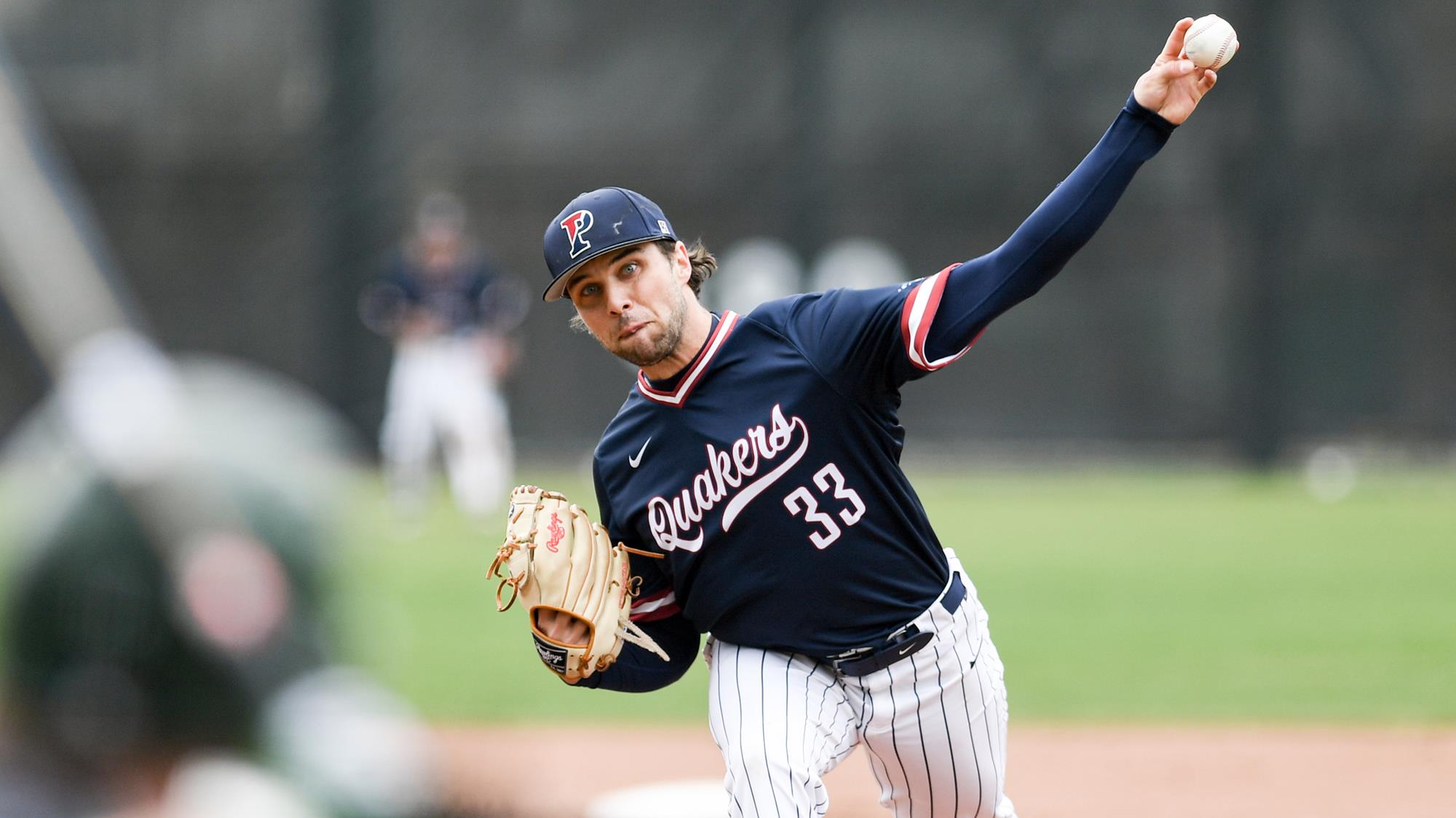 Miller in the process of throwing a pitch during his Penn days.