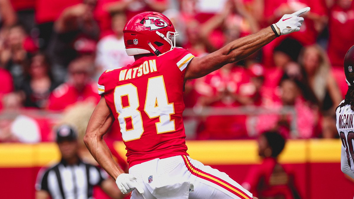 Watson, playing for the Chiefs, makes the first down signal