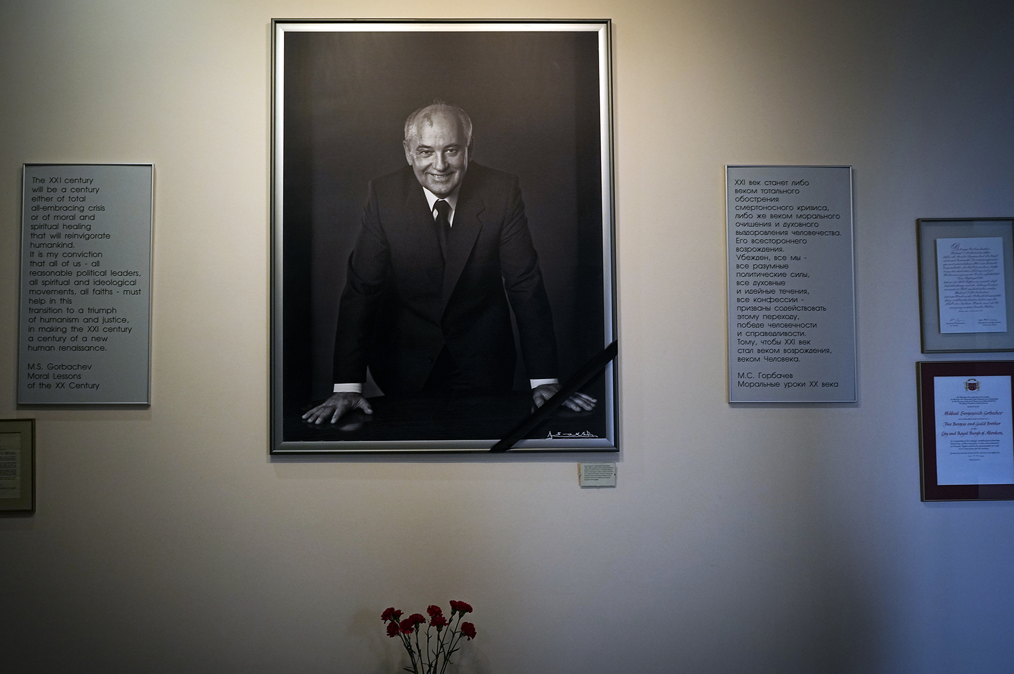 A portrait of former Soviet President Mikhail Gorbachev and flowers at his foundation's headquarters In Moscow
