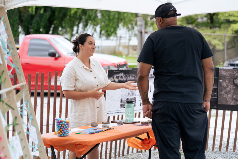 Sara Sterchak talks with someone at at the Juneteenth festival in Kennett Square