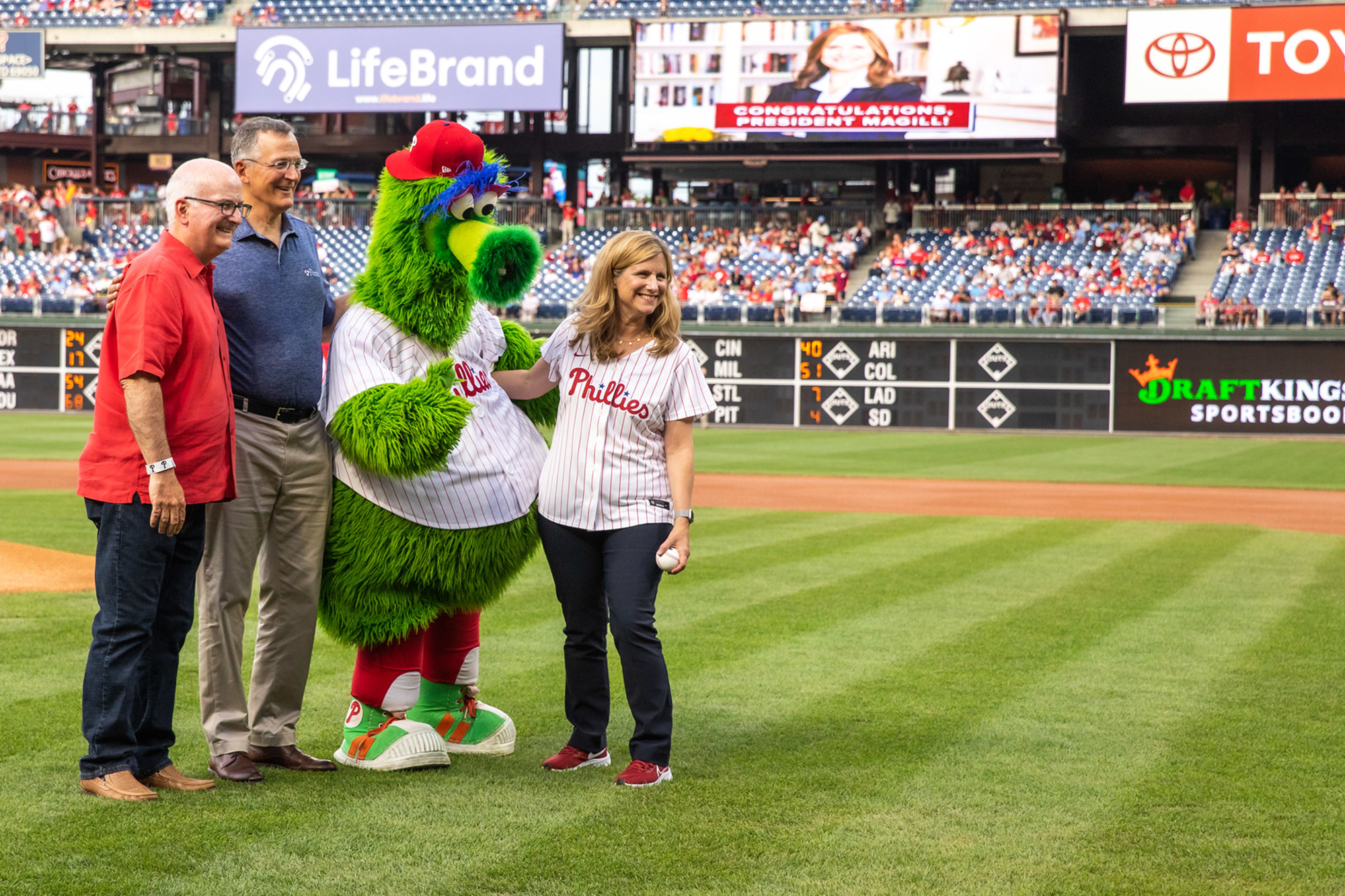 penn president liz magill throws first pitch at phillies game