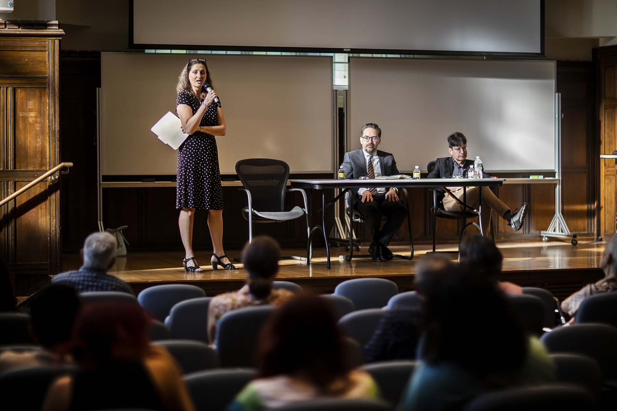 Chenoa Flippen addresses an audience before a panel on Latino voting history.