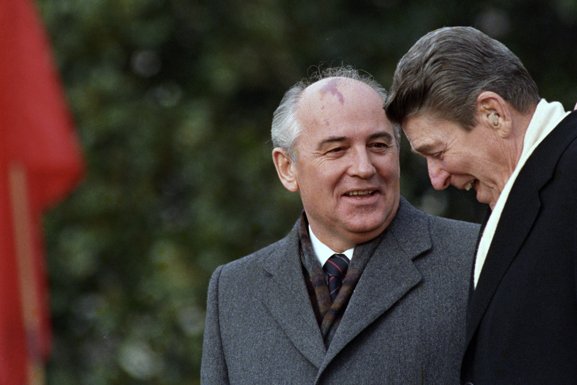 Mikhail Gorbachev speaks with Ronald Reagan.