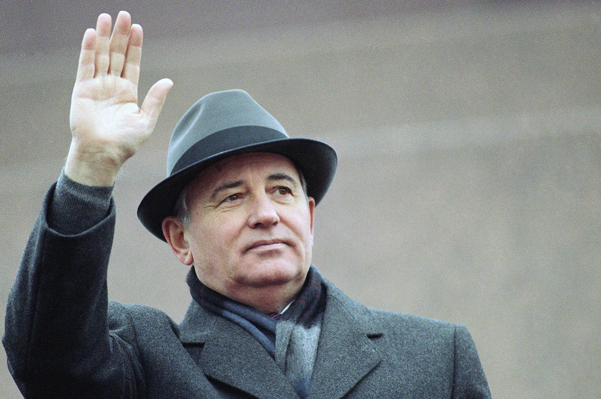 Mikhail Gorbachev waves to a crowd 
