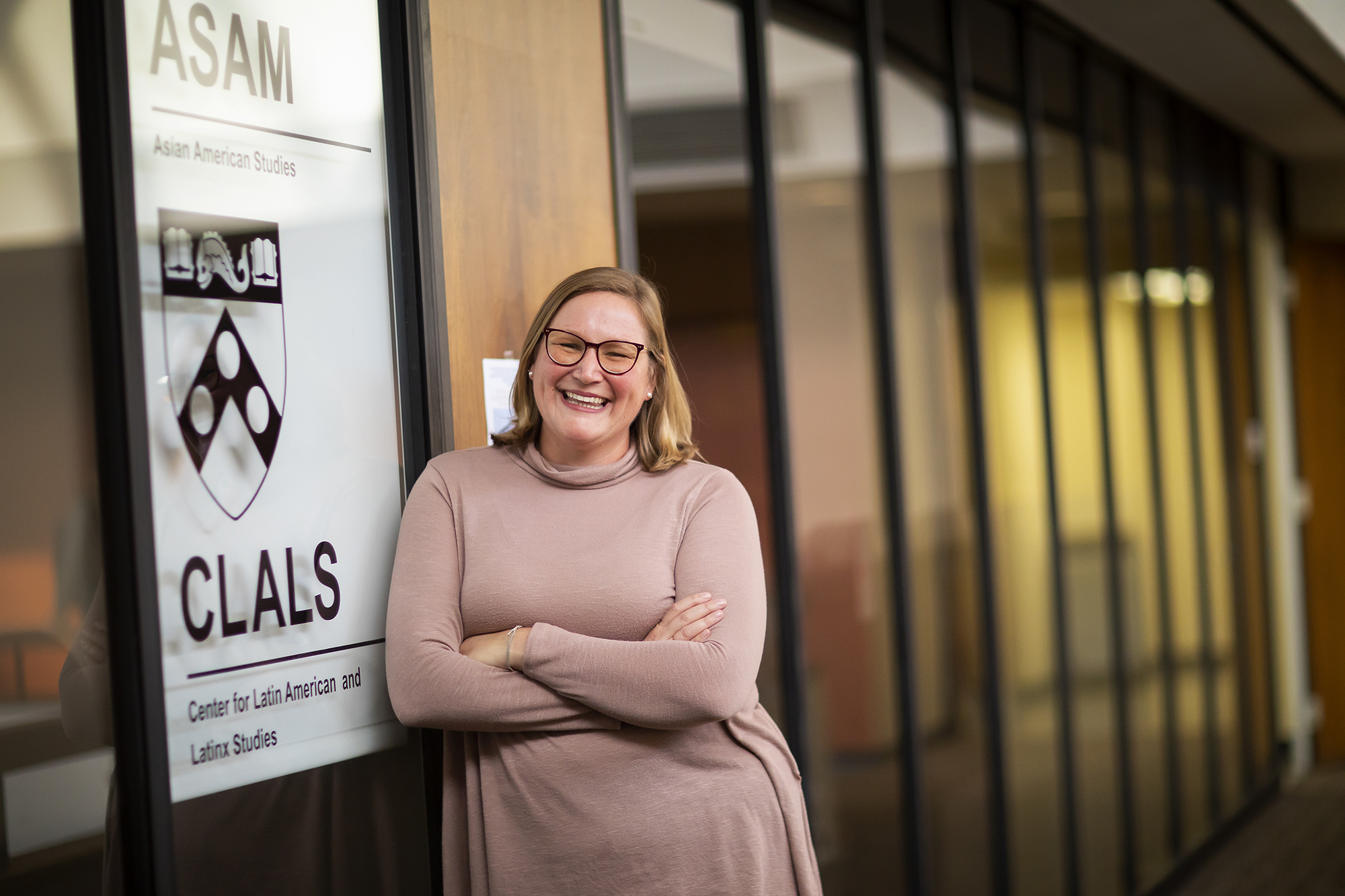 Lucia Stavig poses in front of the Center for Latin American and Latinx Studies (CLALS)