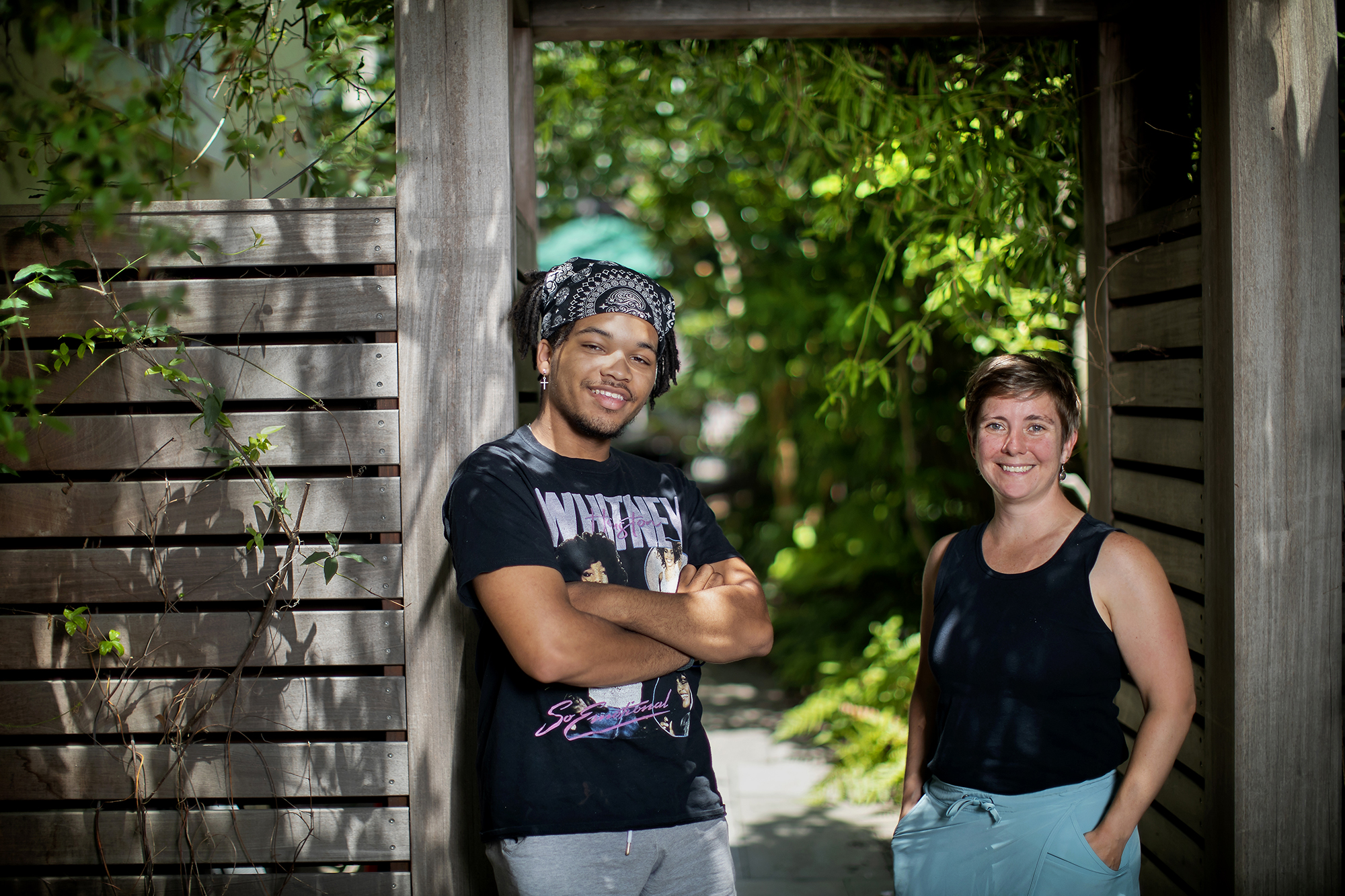 Wes Matthews and Jamie-Lee Josselyn stand together in a doorway outside the Kelly Writers House
