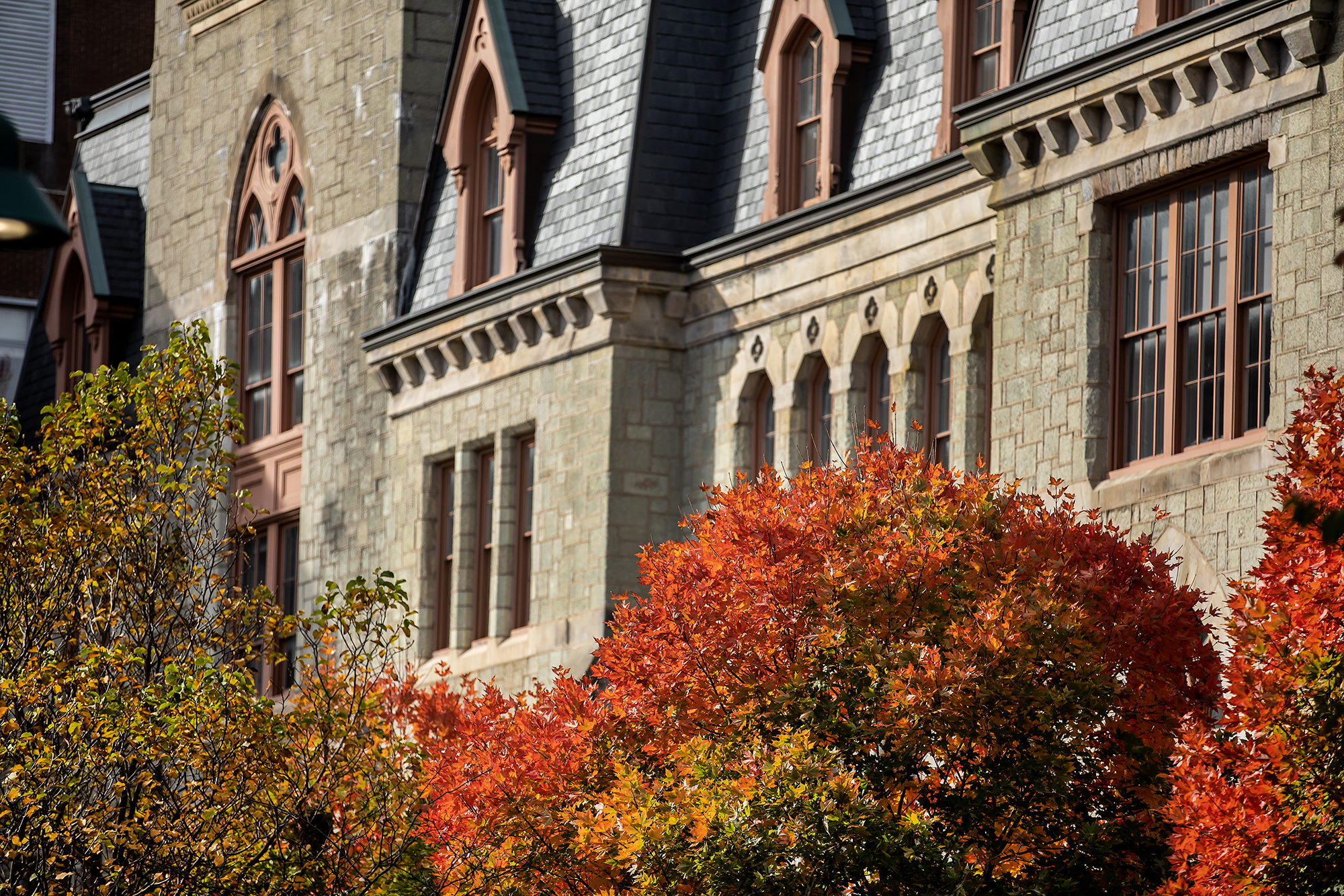 College Hall on Penn campus with bright fall foliage