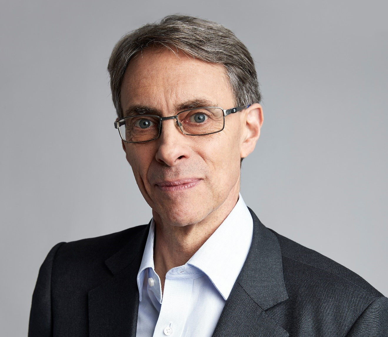 Kenneth Roth, former executive director of Human Rights Watch, looks into the camera in this head shot.