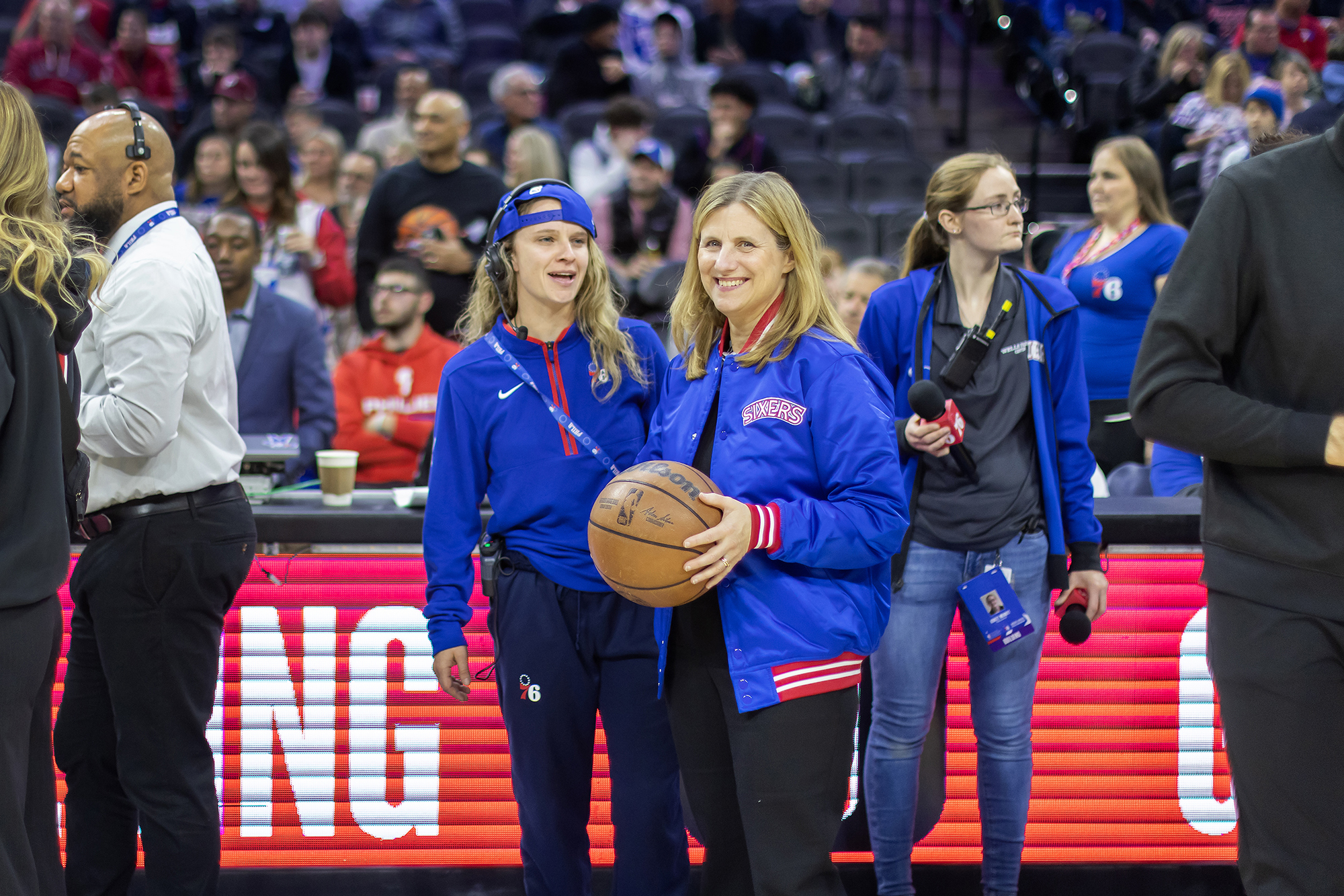 penn president liz magill at a sixer's game