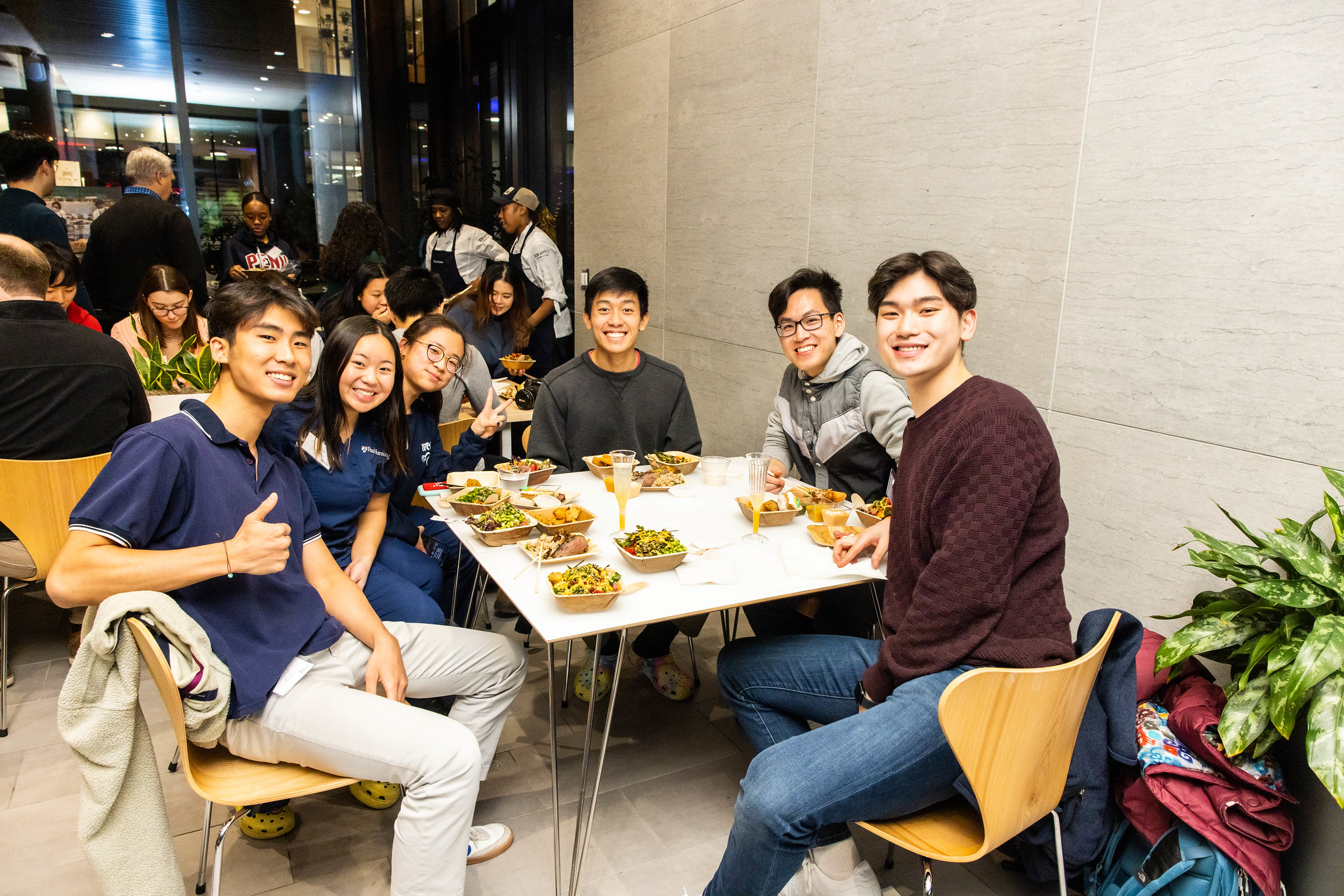 students enjoy food at reception