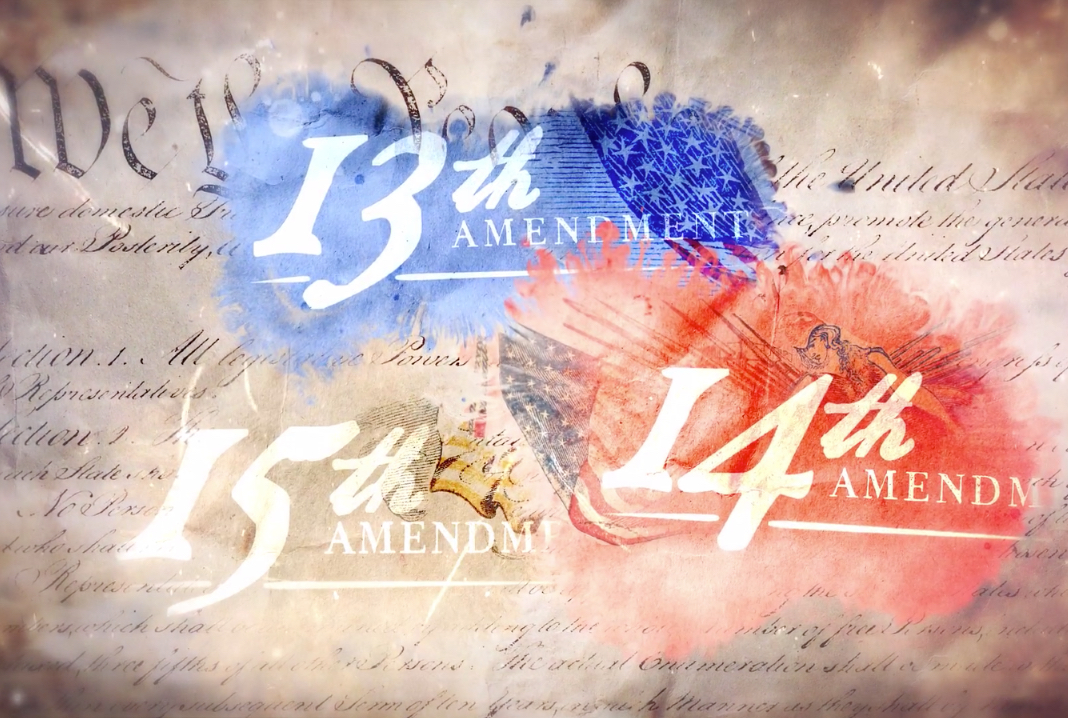 An illustration whose background is the Constitution. The words "We the people" are visible in the background, and the words "13th Amendment," "14th Amendment," and "15th Amendment" are visible in the foreground.