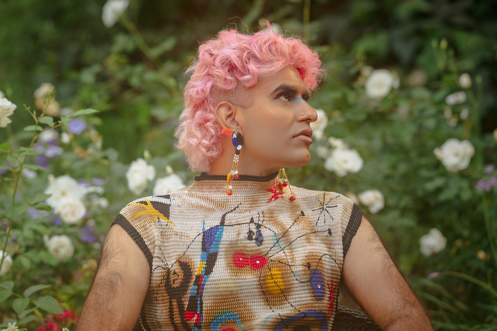 ALOK in a flower field.