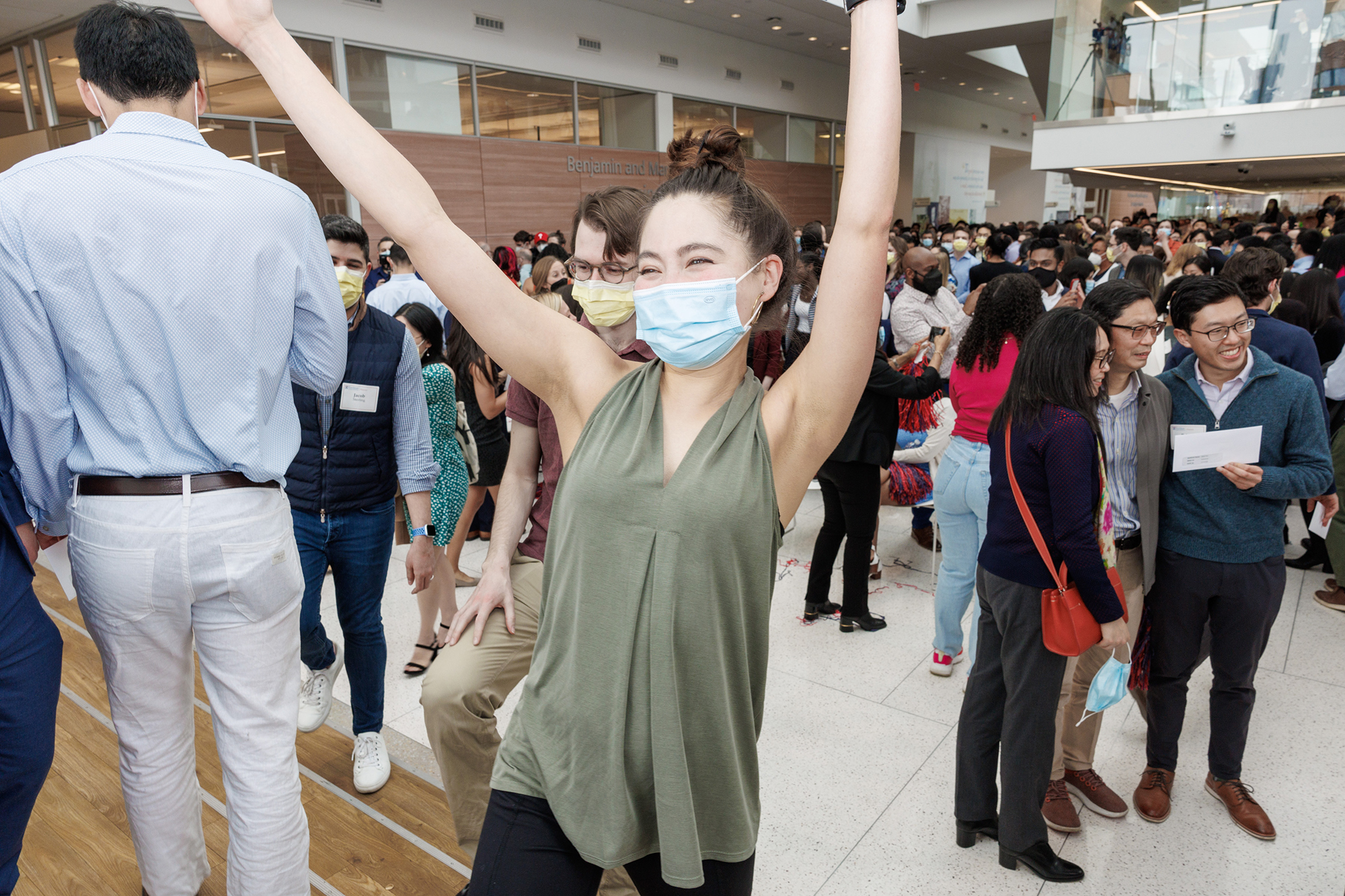 A person celebrating in the atrium at Penn Med's Match Day.