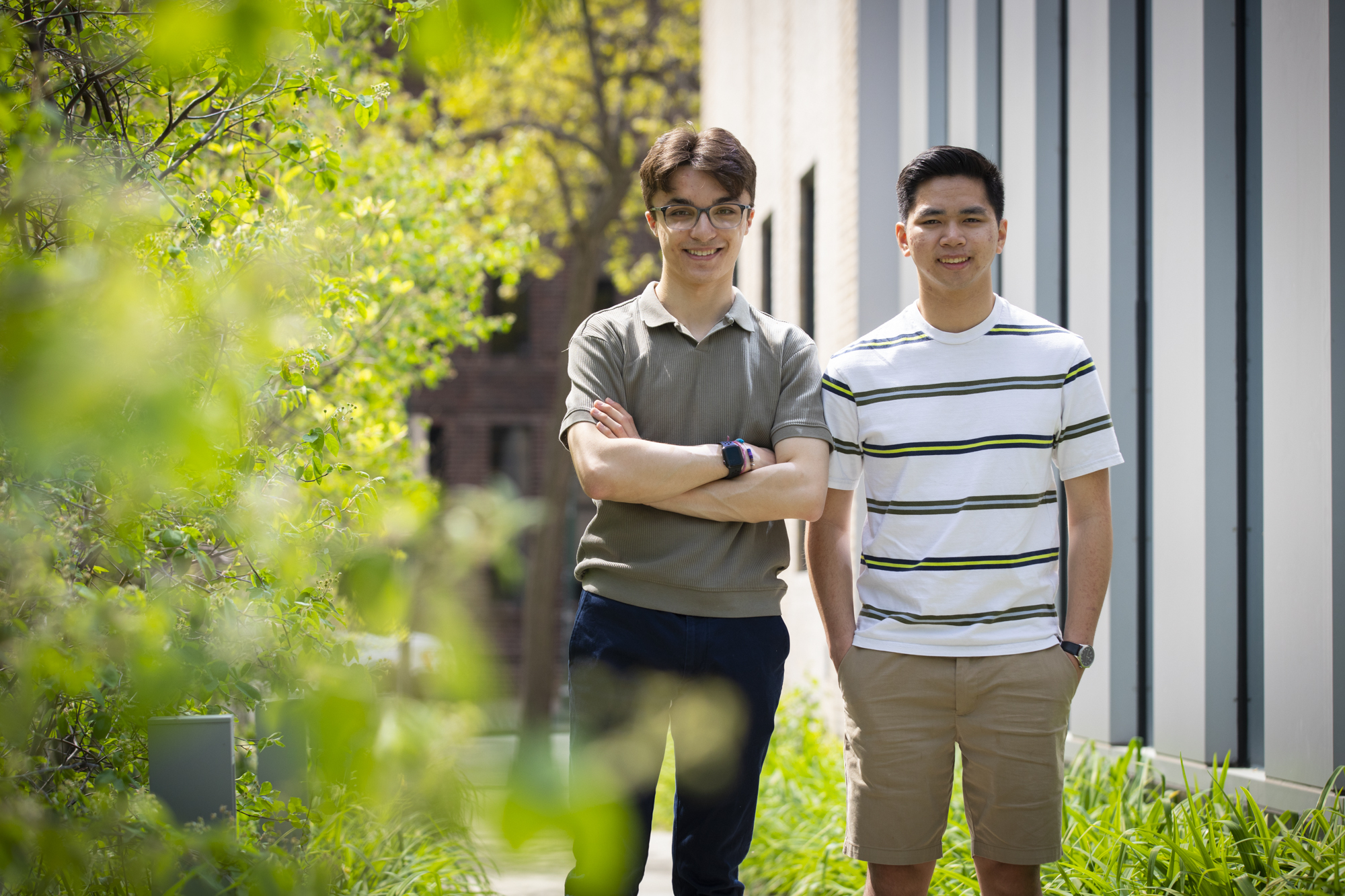 Jared Mitovich and Tyler Jenkins-Wong stand outside the Perelman Center for Economics and Political Science on Penn's campus.