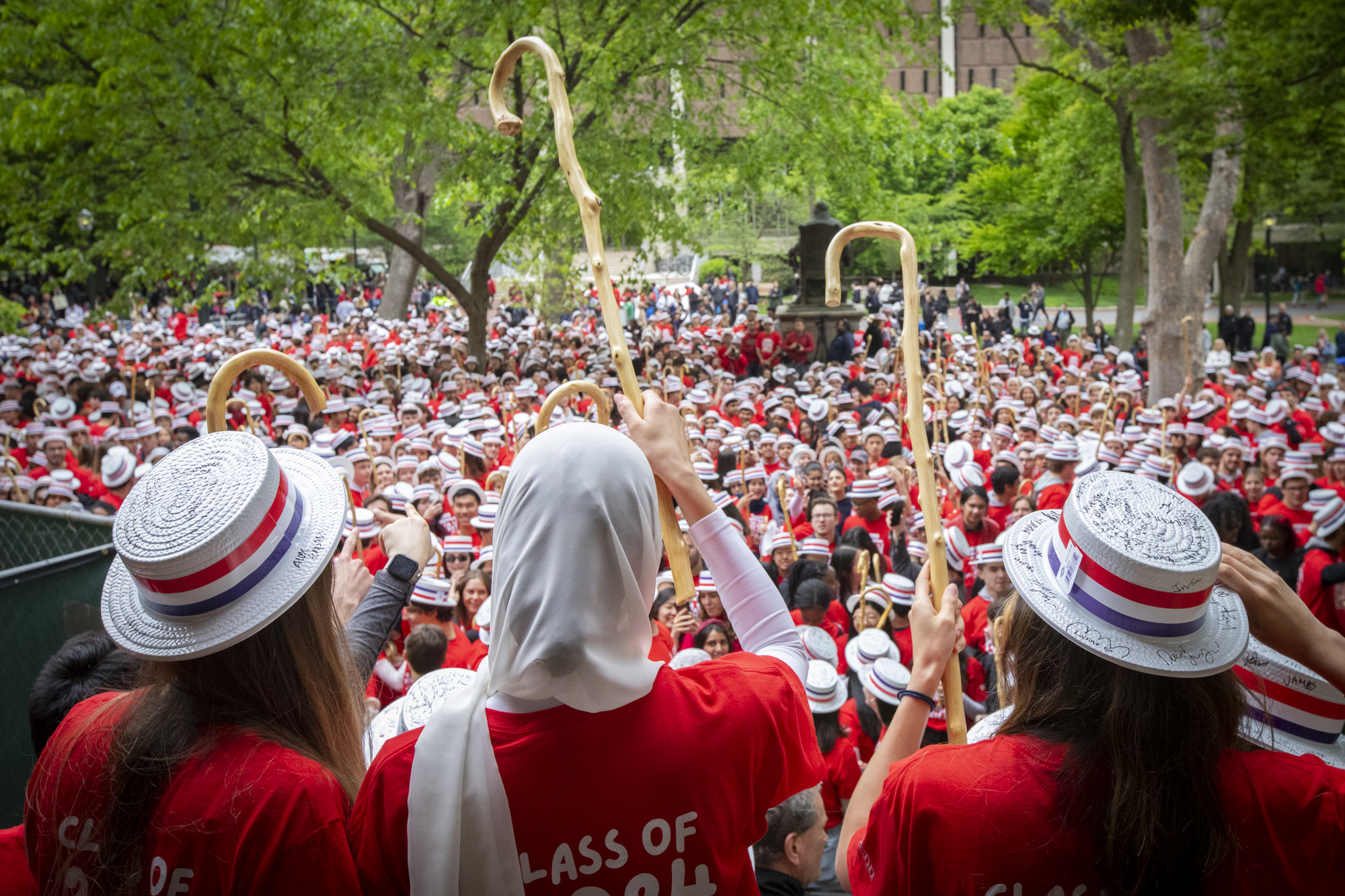 penn students on the steps of college hall during hey day