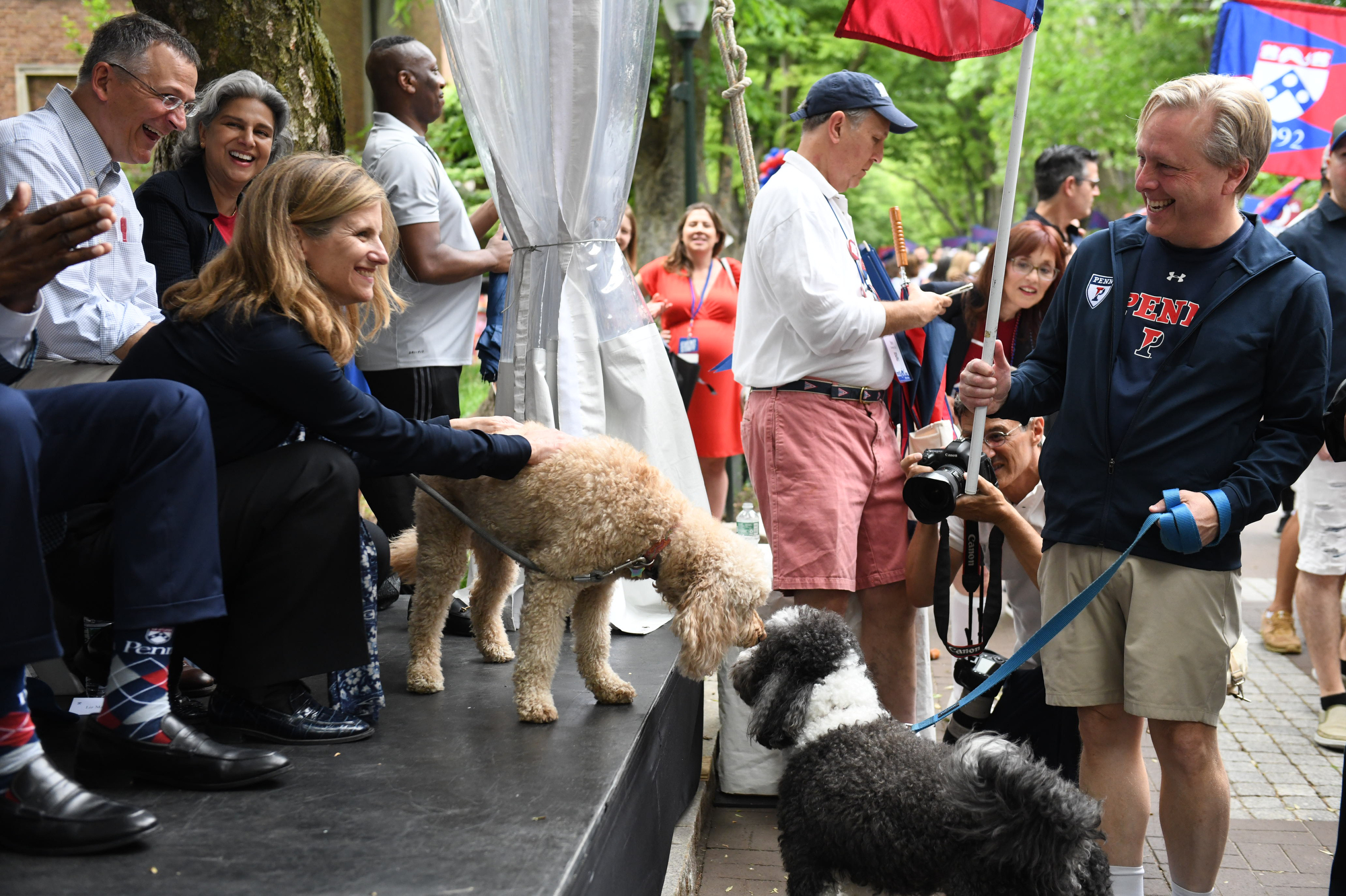 president liz magill and her dog at the alumni weekend parade